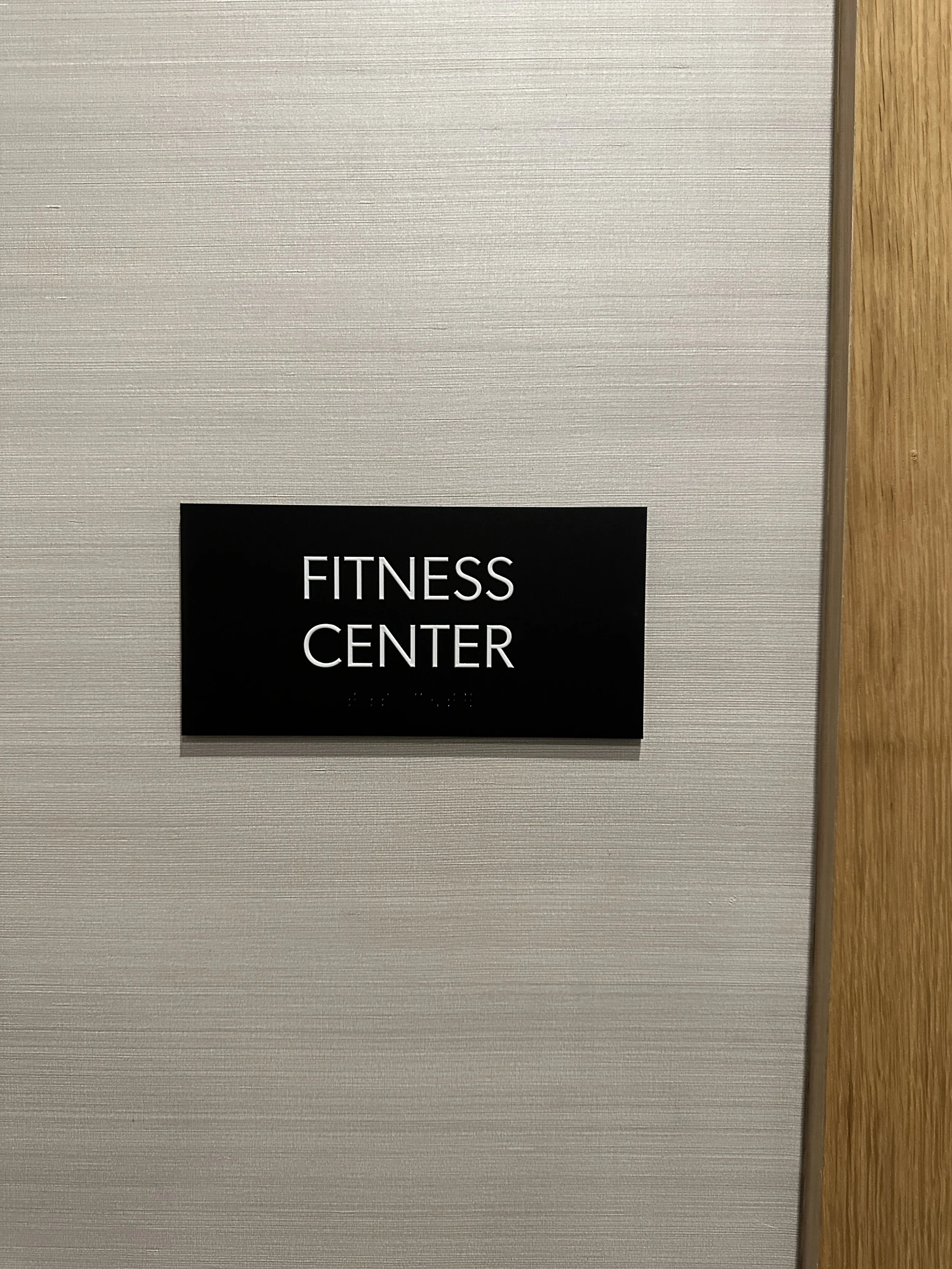 Tactile fitness center sign