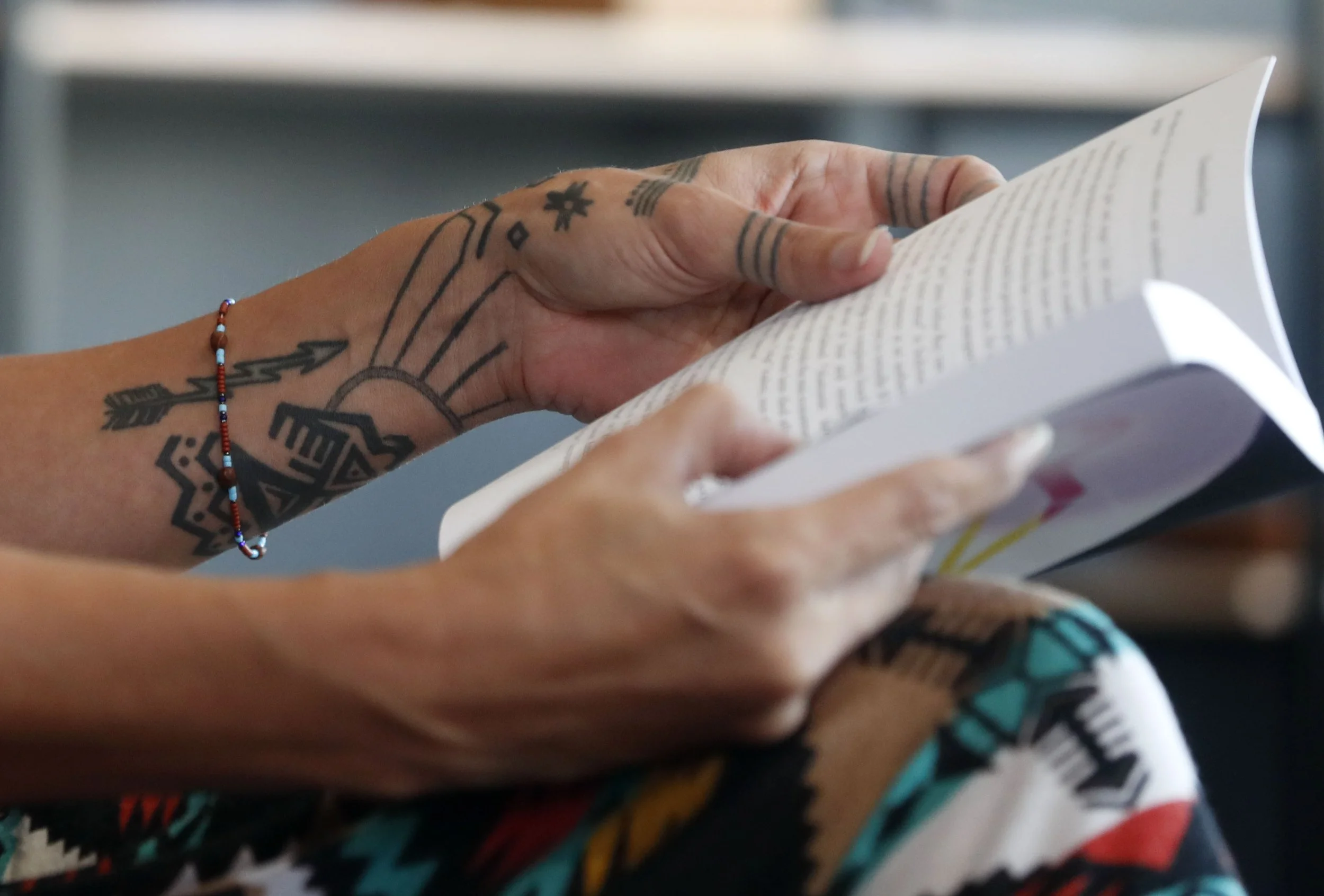  Stephanie Big Eagle reads from her book Thunderbird Rising during an Indigenous People's Day event Monday, Oct. 11, 2021, at Thunderbird Rising Studios in Indianapolis' Fountain Square neighborhood. The meet and greet event featured fancy shawl danc