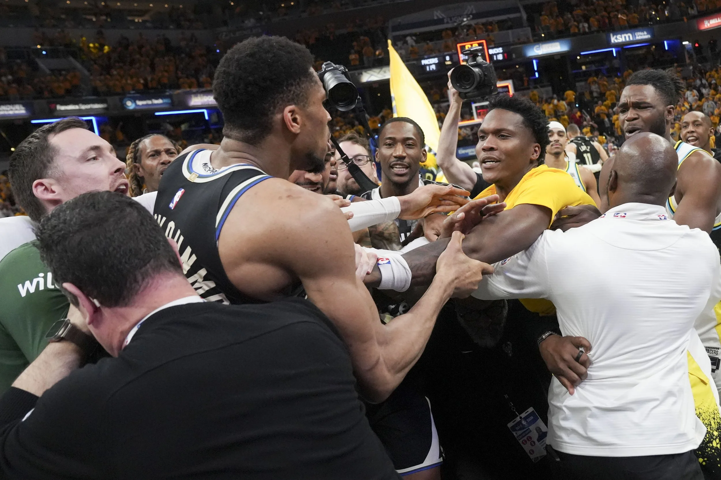  Indiana Pacers guard Bennedict Mathurin (00) and Milwaukee Bucks forward Giannis Antetokounmpo (34) push at each other Tuesday, April 29, 2025, during a game against the Milwaukee Bucks at Gainbridge Fieldhouse in Indianapolis. 