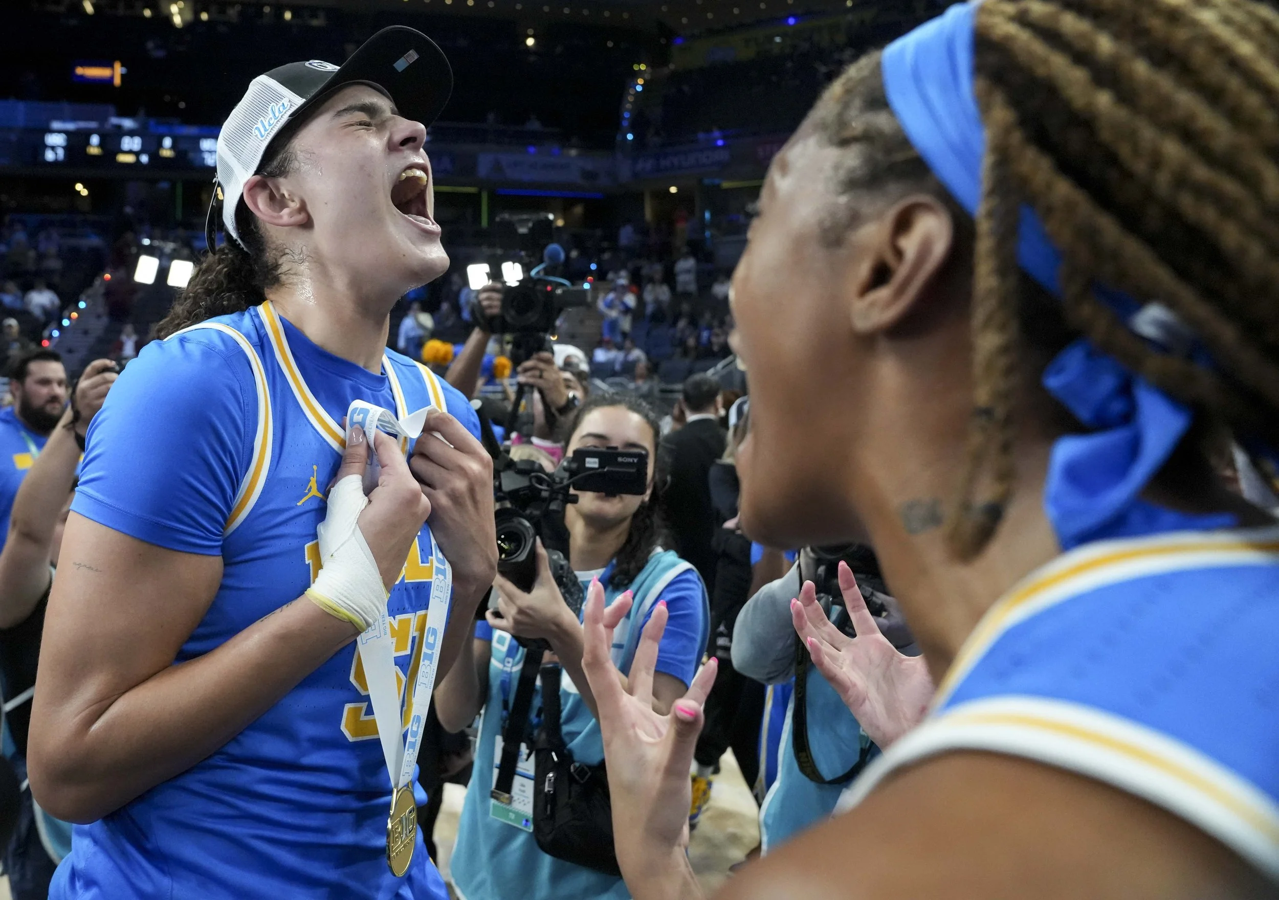 UCLA Bruins center Lauren Betts (51) reacts after her team defeats the USC Trojans during the 2025 TIAA Big Ten Women's Basketball Tournament final on Sunday, March 9, 2025, at Gainbridge Fieldhouse in Indianapolis. UCLA defeated USC 72-67. 