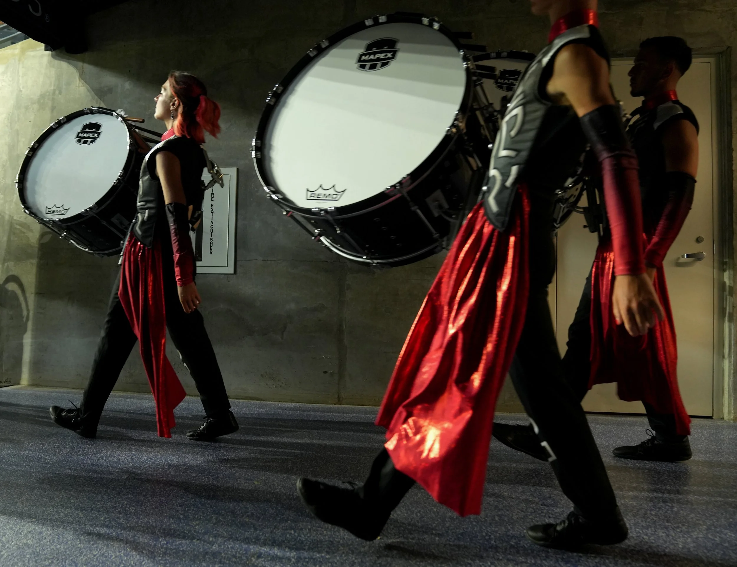  Members of The Academy, of Tempe, Ariz., enter the field to perform during the Drum Corps International World Championship Prelims on Thursday, Aug. 8, 2024, at Lucas Oil Stadium in Indianapolis. 