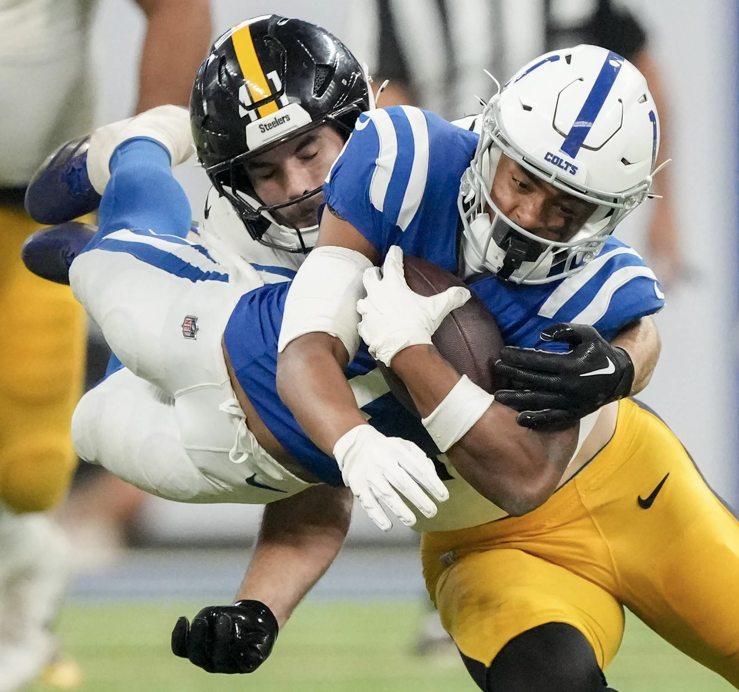  Indianapolis Colts wide receiver Josh Downs (1) is brought down by Pittsburgh Steelers linebacker Payton Wilson (41) on Sunday, Sept. 29, 2024, during a game against the Pittsburgh Steelers at Lucas Oil Stadium in Indianapolis. 