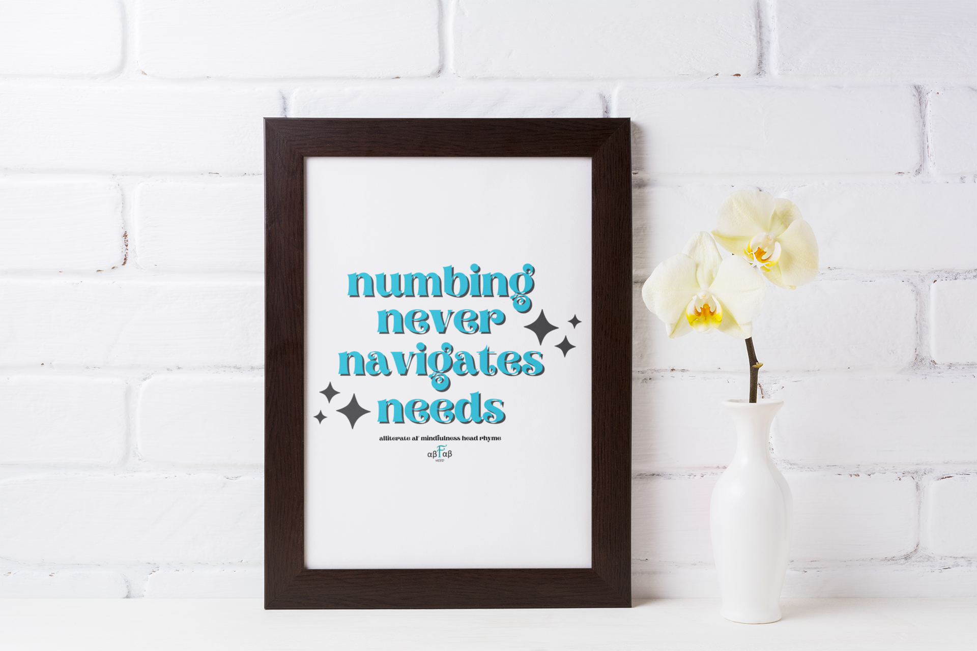 Framed quote on a white wall that reads 'numbing never navigates needs' with small star icons, placed next to a white vase with an orchid flower.