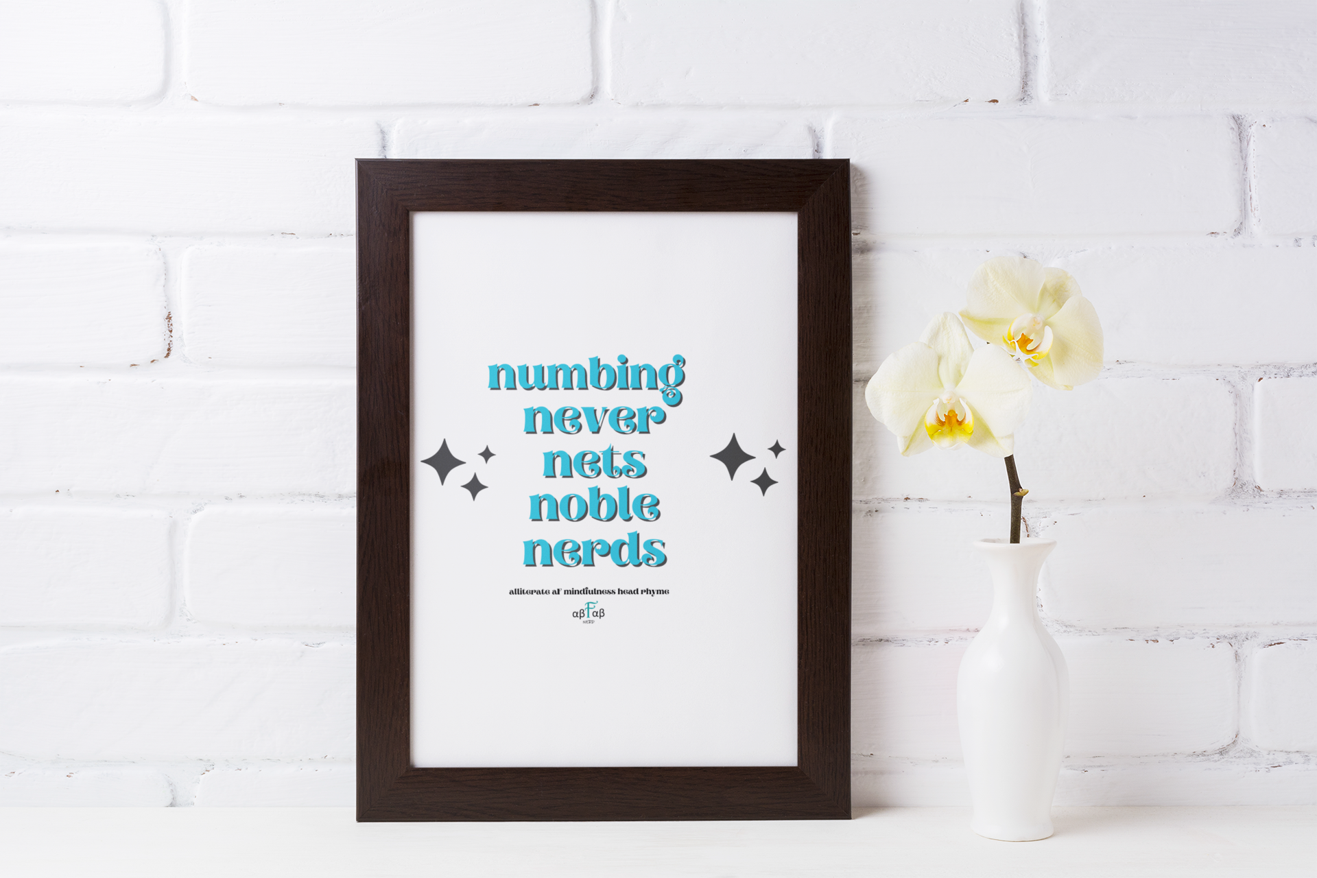 Framed poster with humorous words in blue text on a white background, placed next to a white vase with a white orchid flower, against a white brick wall.