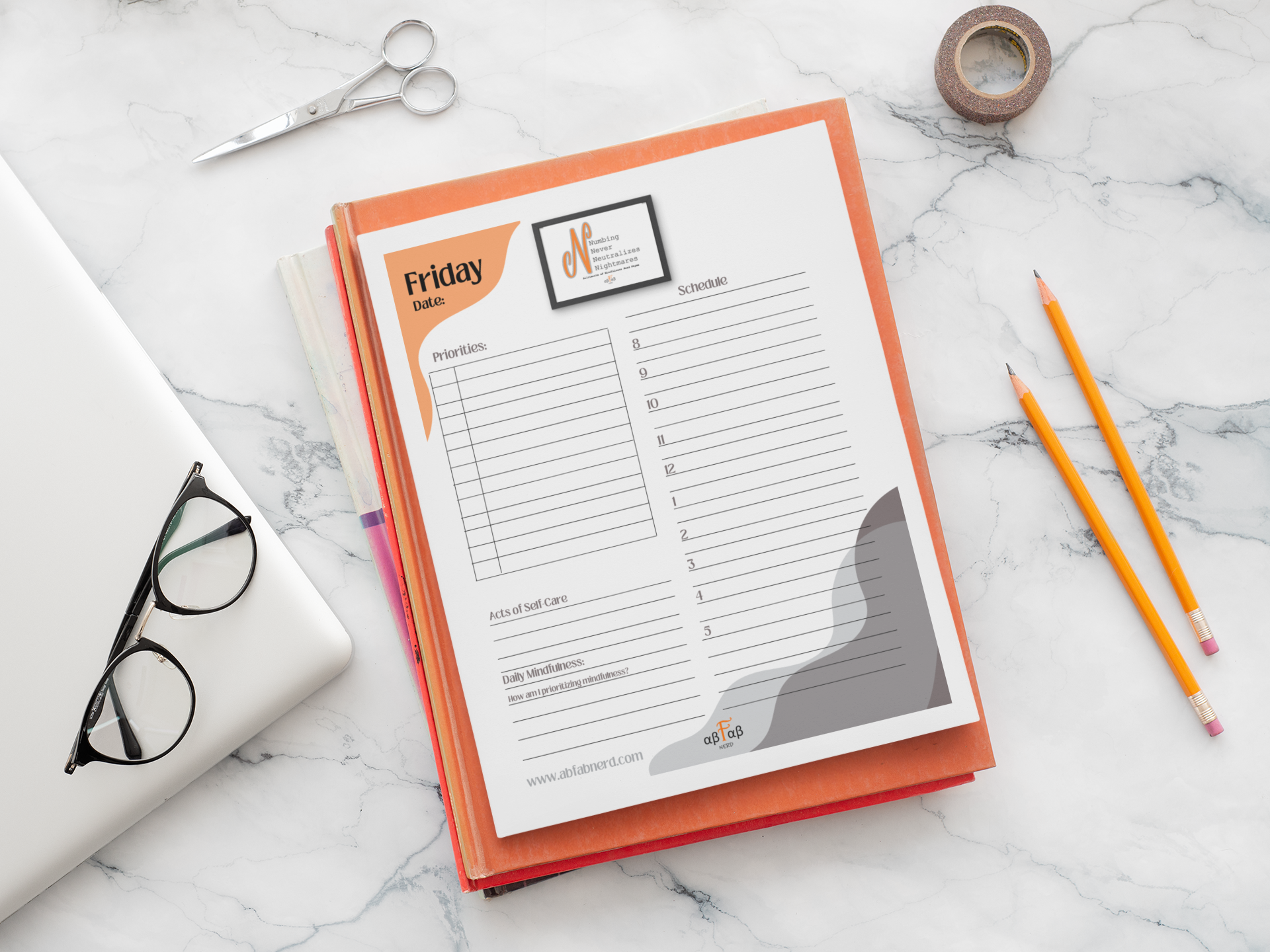 A weekly planner or scheduling sheet on top of an orange book, with a pair of glasses and a closed laptop nearby, a pair of scissors, two orange pencils, and a roll of decorative tape on a white marble surface.