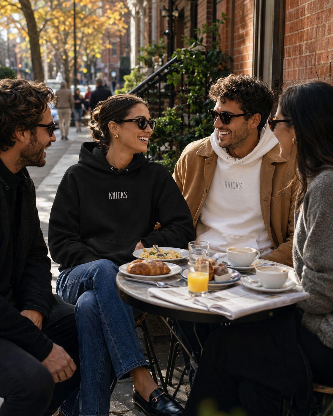 Knicks Hoodie White Embroidered Lettering Group Shot NYC.png