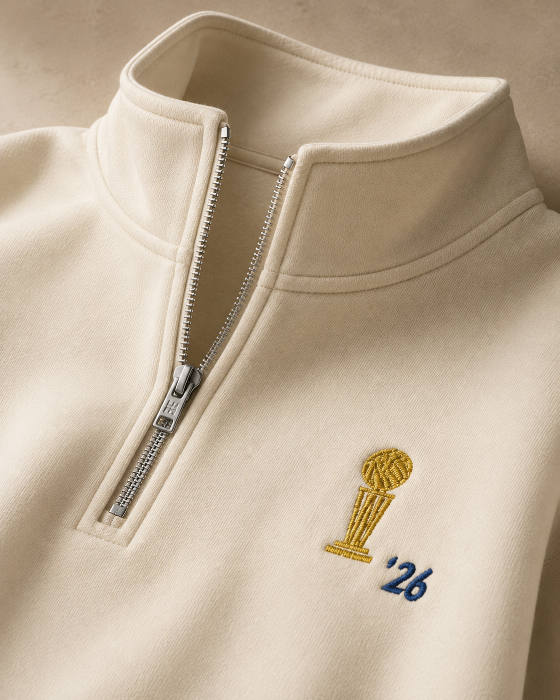 Knicks Quarter Zip Embroidered Front and Back Closeup Embroidery.png
