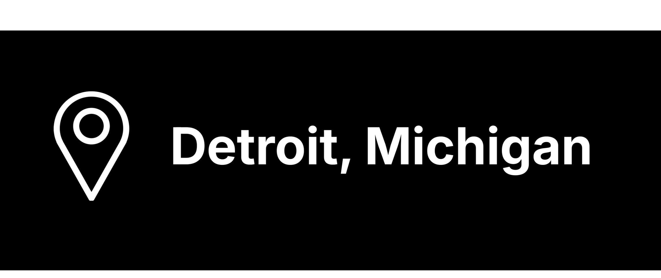 Map marker icon next to the text 'Detroit, Michigan' on a black background.