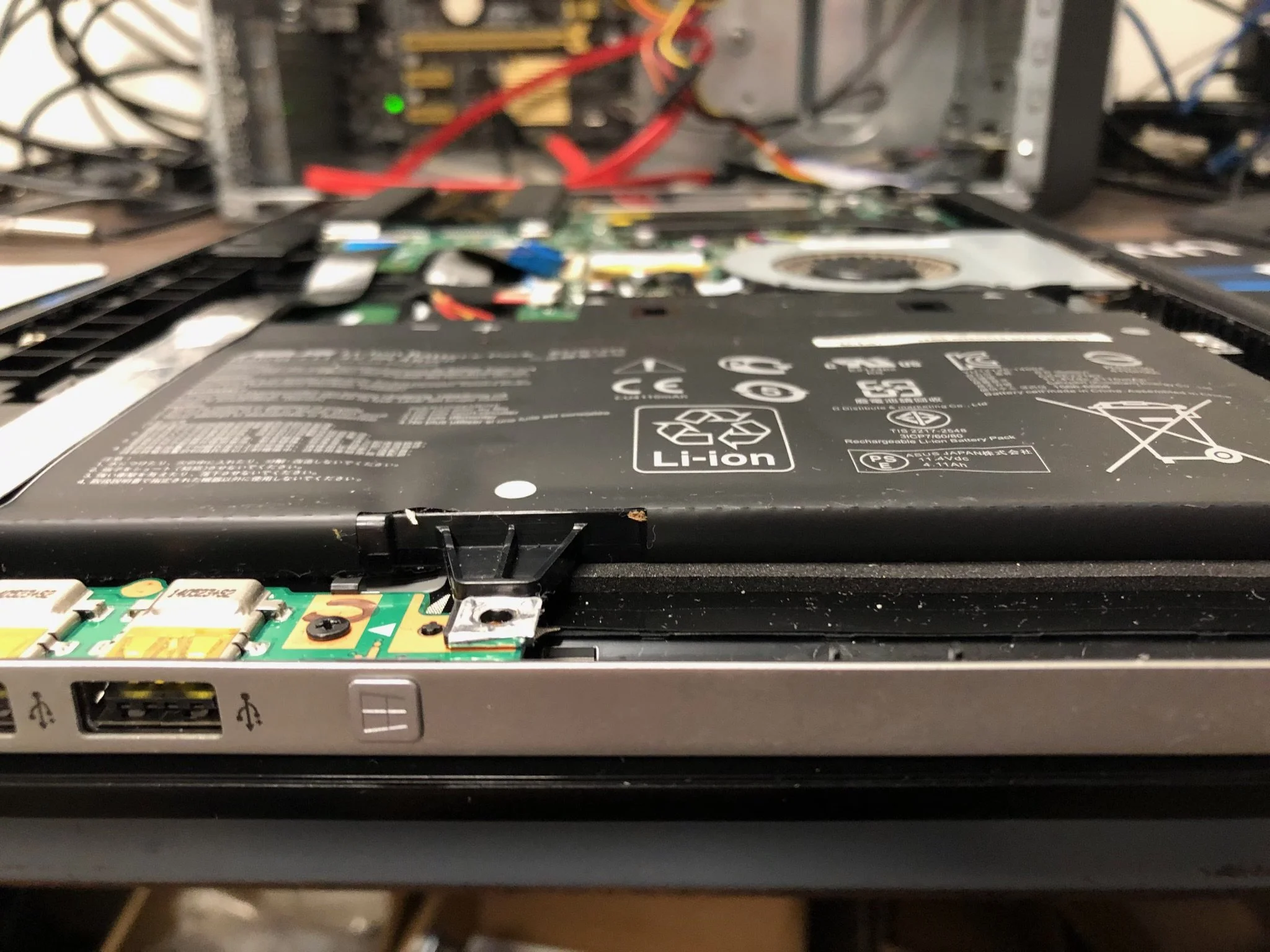 The Notebook battery Is Starting To Swell — Priority 1 Computer Service