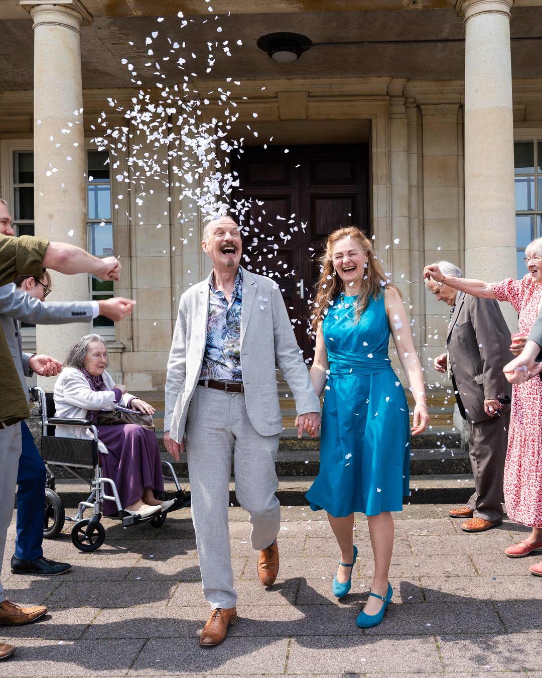 Weddings don't always look like expensive white dresses, overflowing bouquets and hundreds of guests. 

Often-times weddings are small and intimate with outfits that match the couples personalities and without a flower in sight!

The important thing 