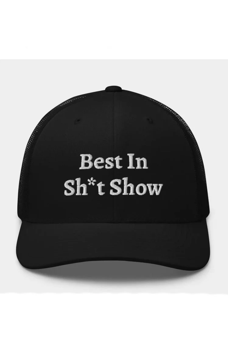 UN.SUS.TAIN.A.BLE Apparel Best in Sh*T Show Trucker Hat In Black