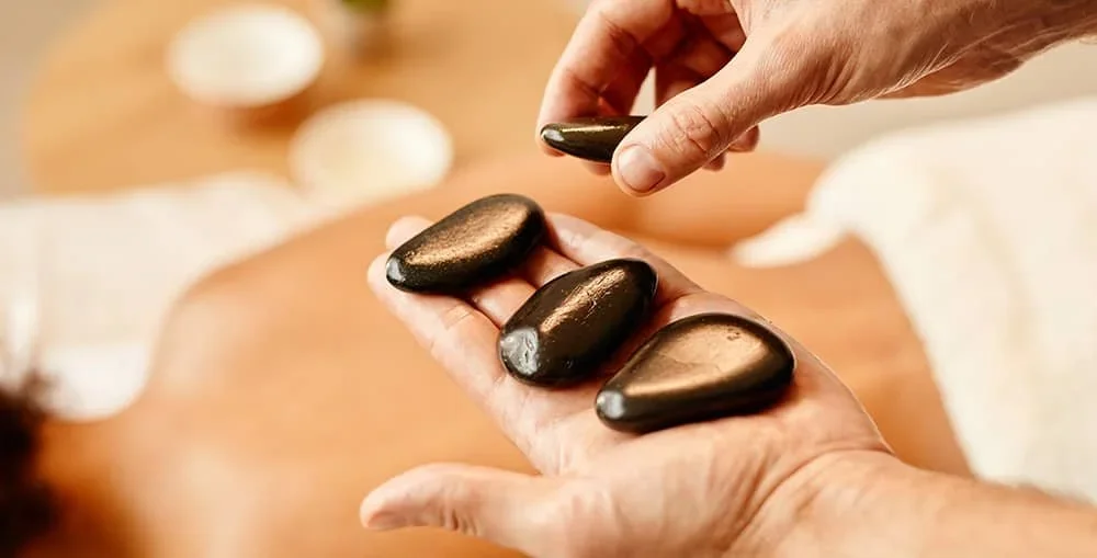Warmth That Works: The Impacts of Hot Stones 