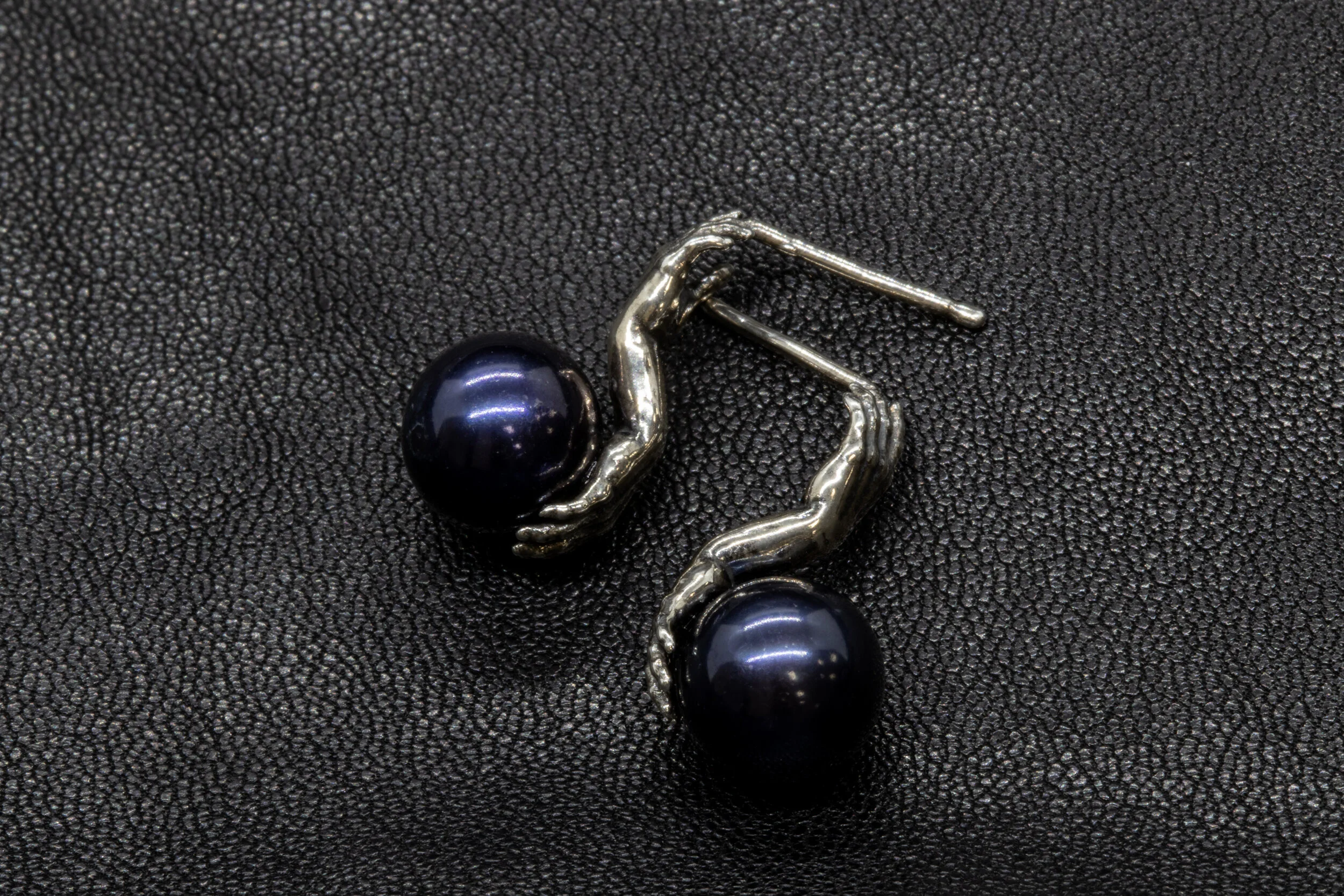 Letting It Go Earrings, 2021. Sterling Silver, Tahitian Pearls