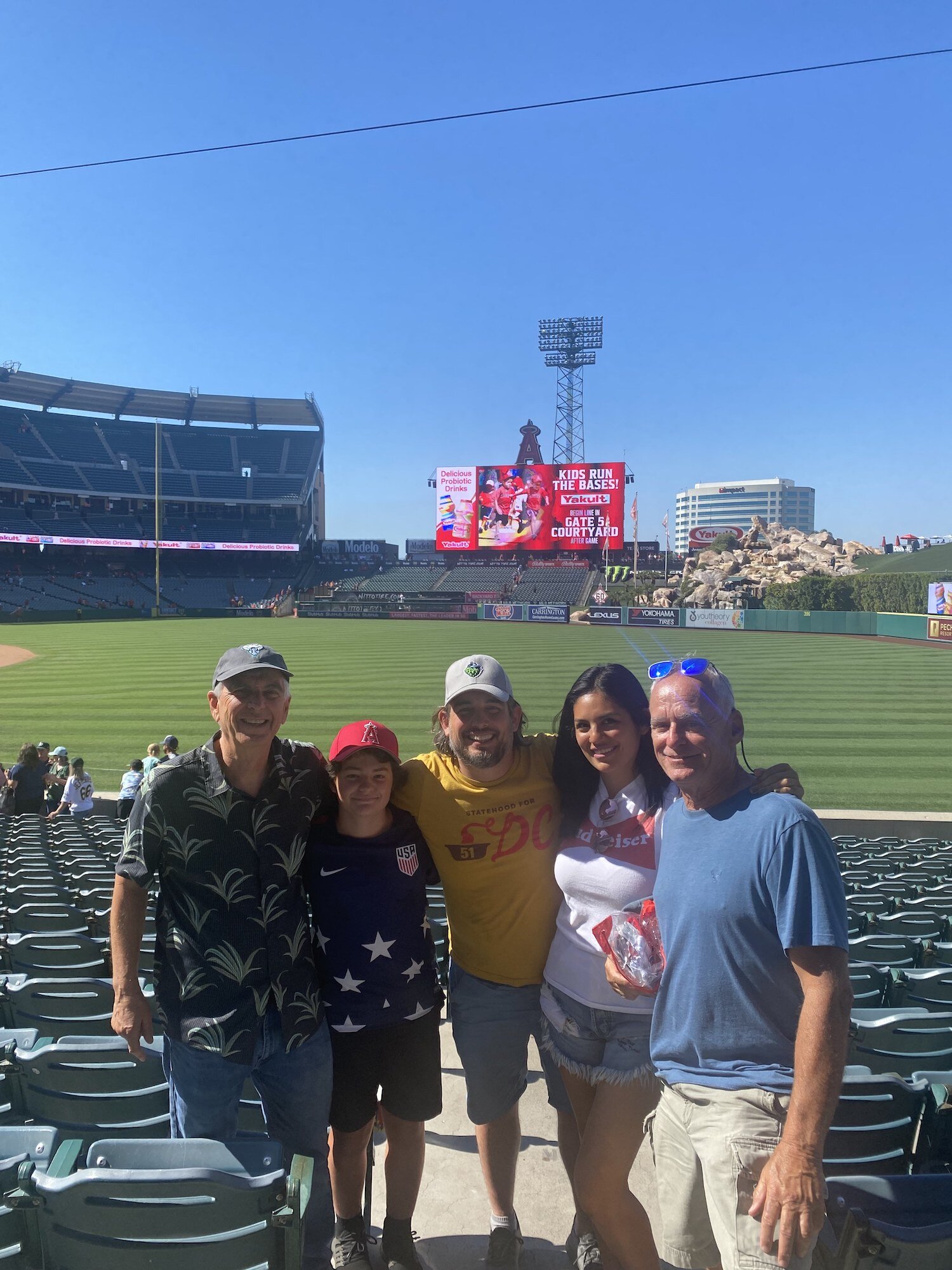 Ollie and I with Uncle Braden, cousin Taylor and my brother Jamie inside Angel's Stadium