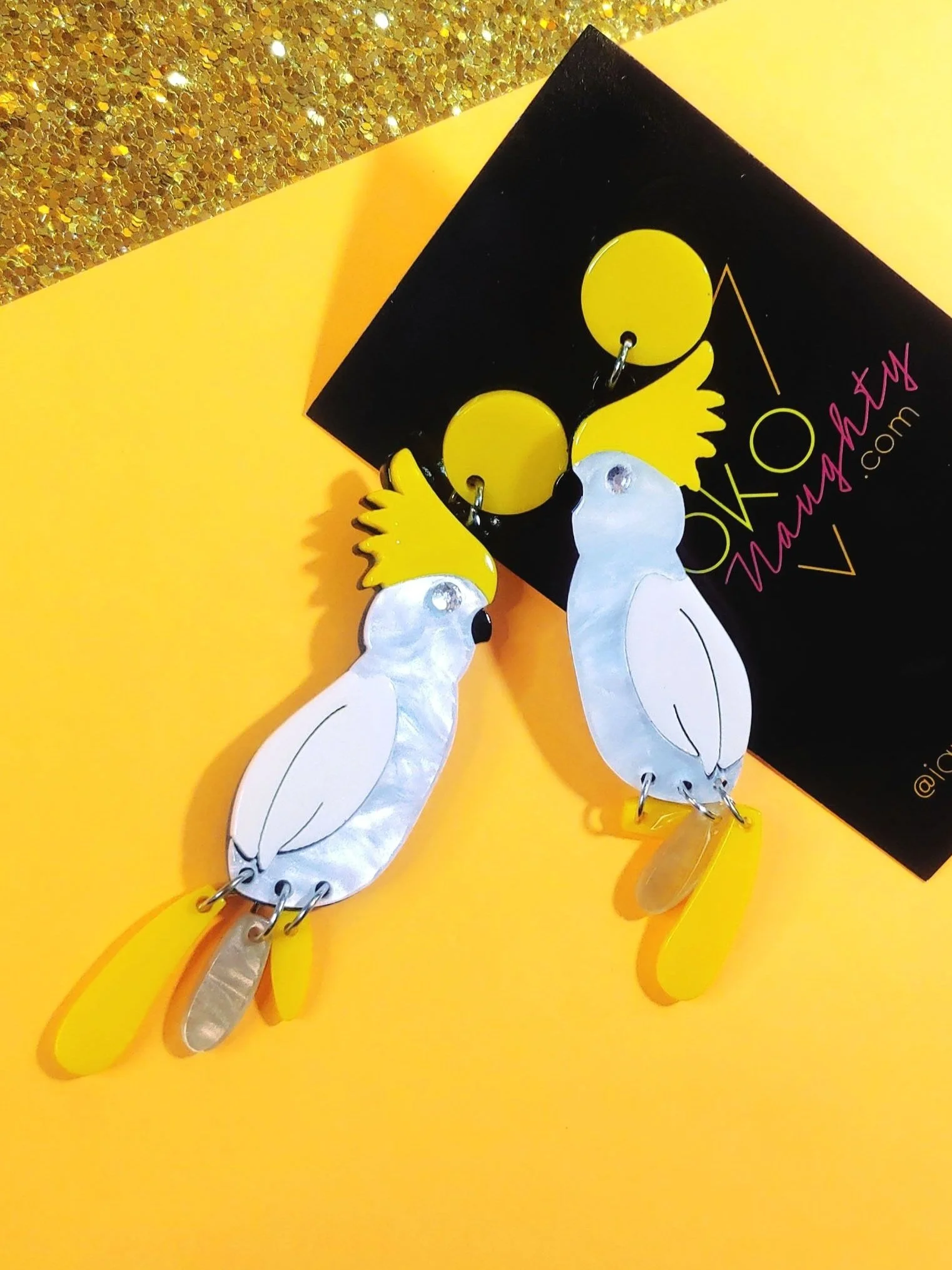 kitschy tropical bird tiki bar tiki pinup cockatoo parrot earrings