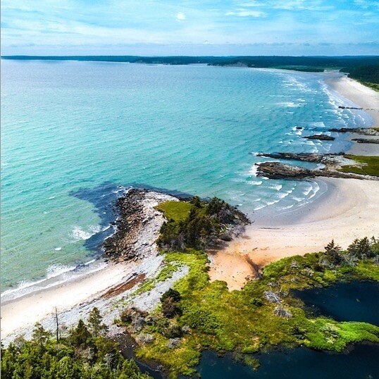 HERE COMES BEACH WEATHER!

This is Clam Harbour Beach Provincial Park, famous for &ndash; among many things &ndash; the annual sandcastle competition that takes place in August. 
	
The beach here is supremely family friendly, with a warm tidal stream