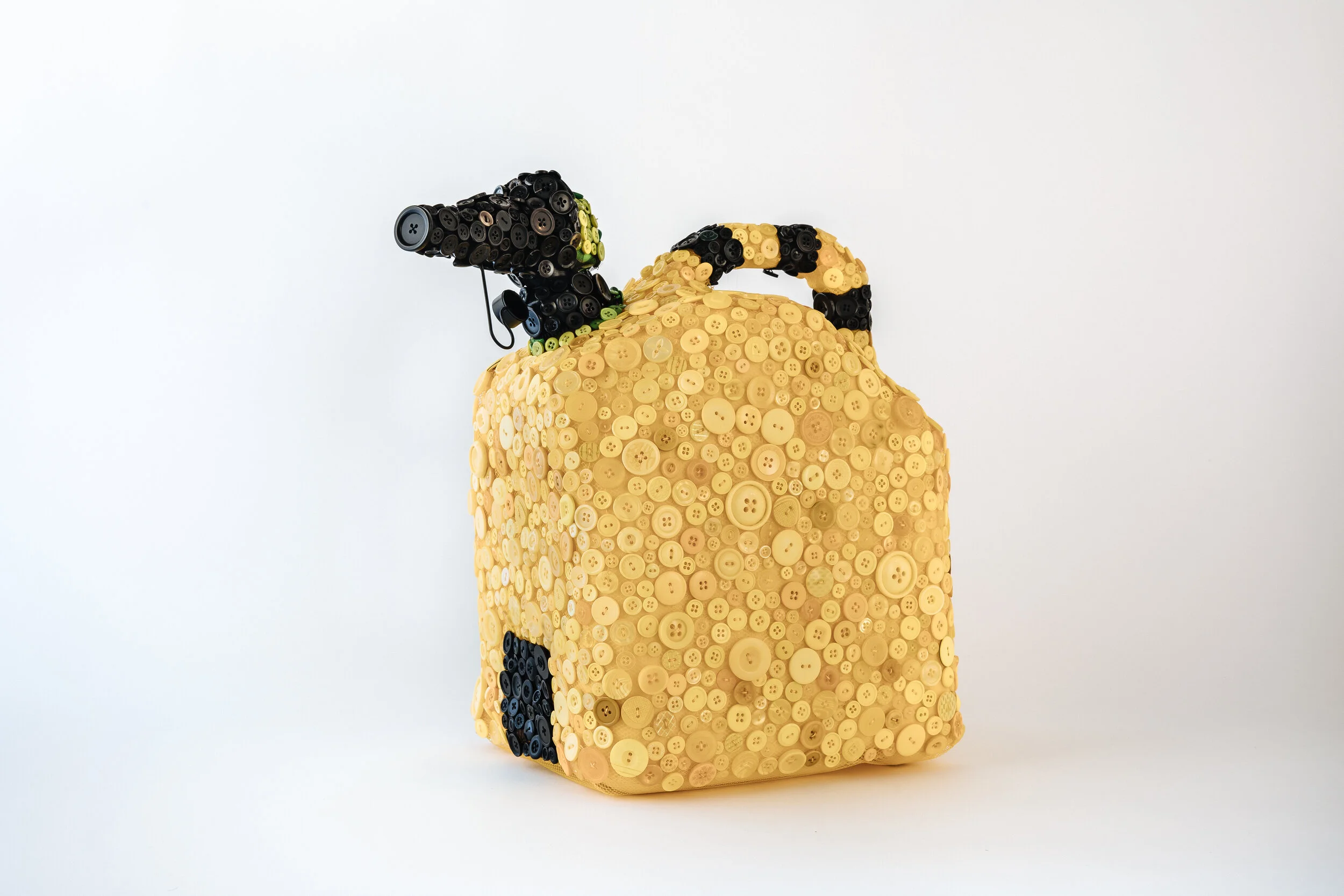 "Yellow Diesel"
18 x 16 x 9in, diesel can, netting, organza, buttons, 2021