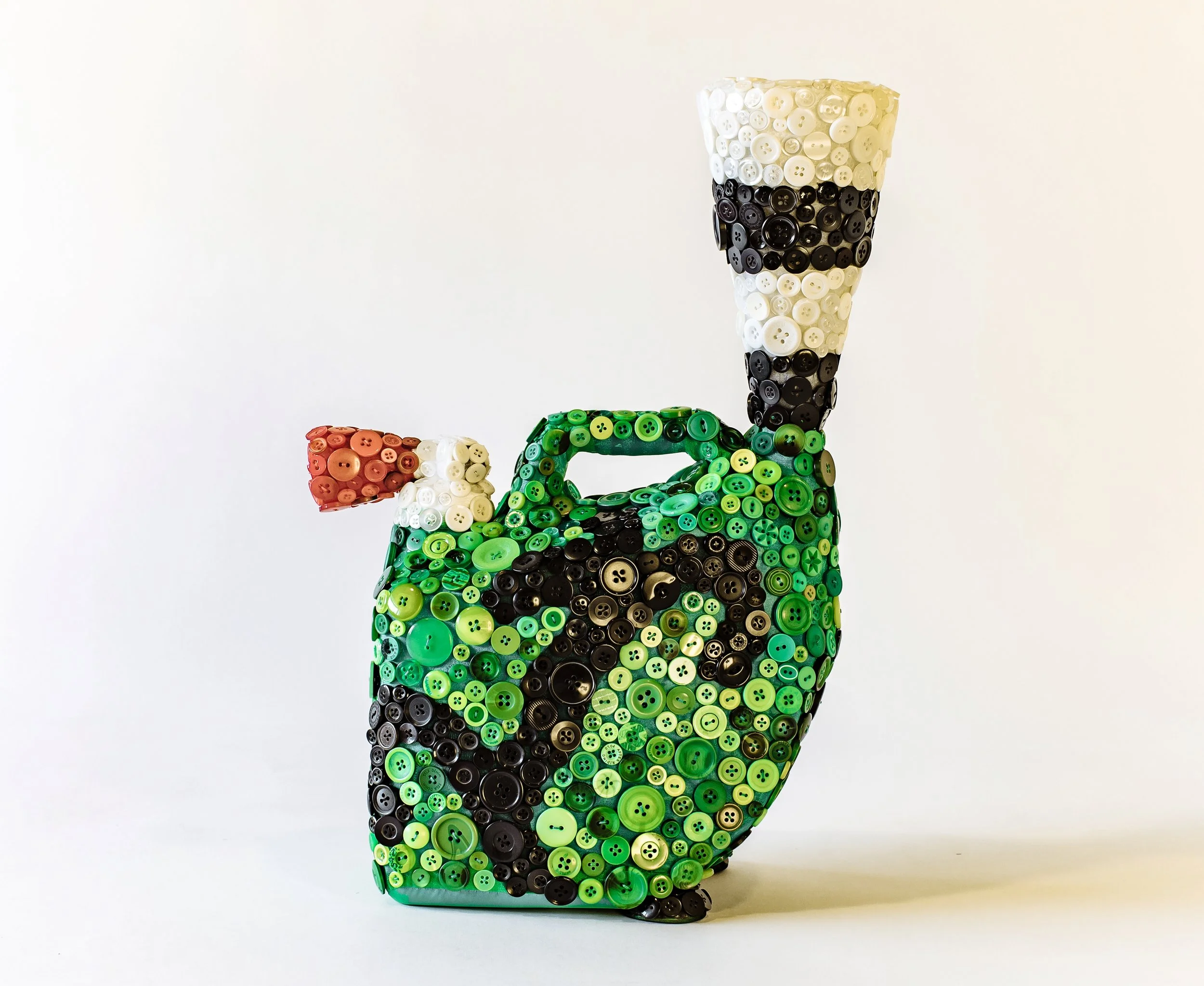 “Nanday”  18 x 13 x 7in 
manipulated jug, organza, buttons 2021