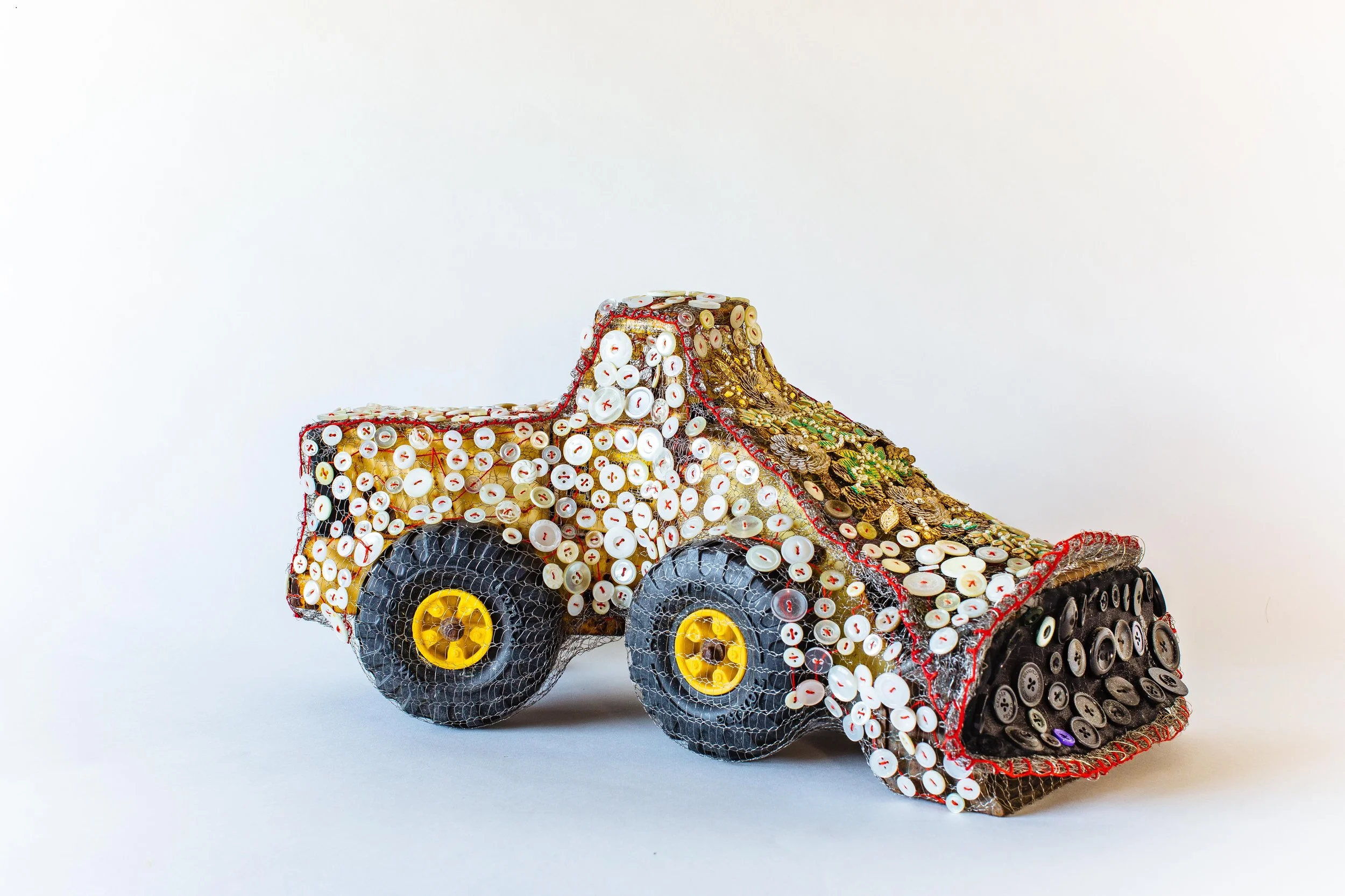 "Pearly Queen-Dozer"
11 x 18 x 8in, vintage Tonka, wire mesh, buttons, 2019