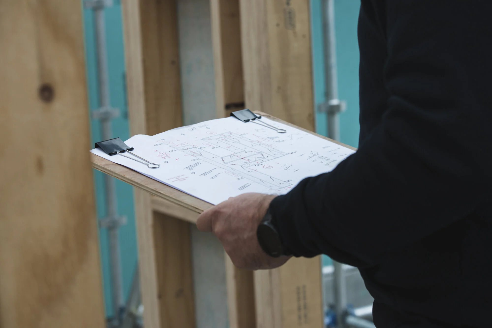 Builder looking at plans.