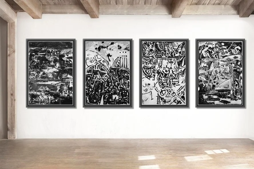 Four large black and white artworks framed on paper in gallery setting.