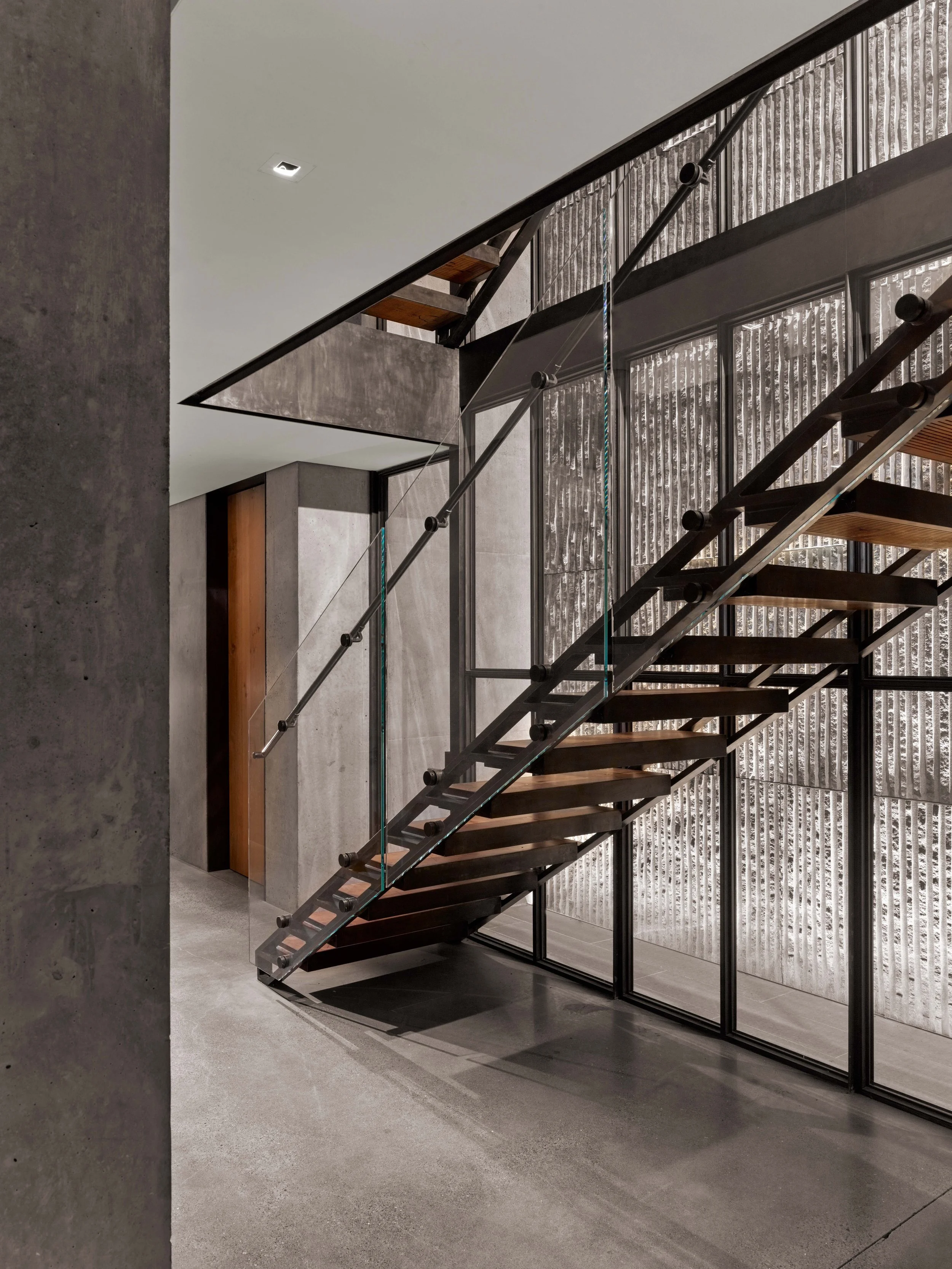 Custom blackened steel staircase in a Telegraph Hill home