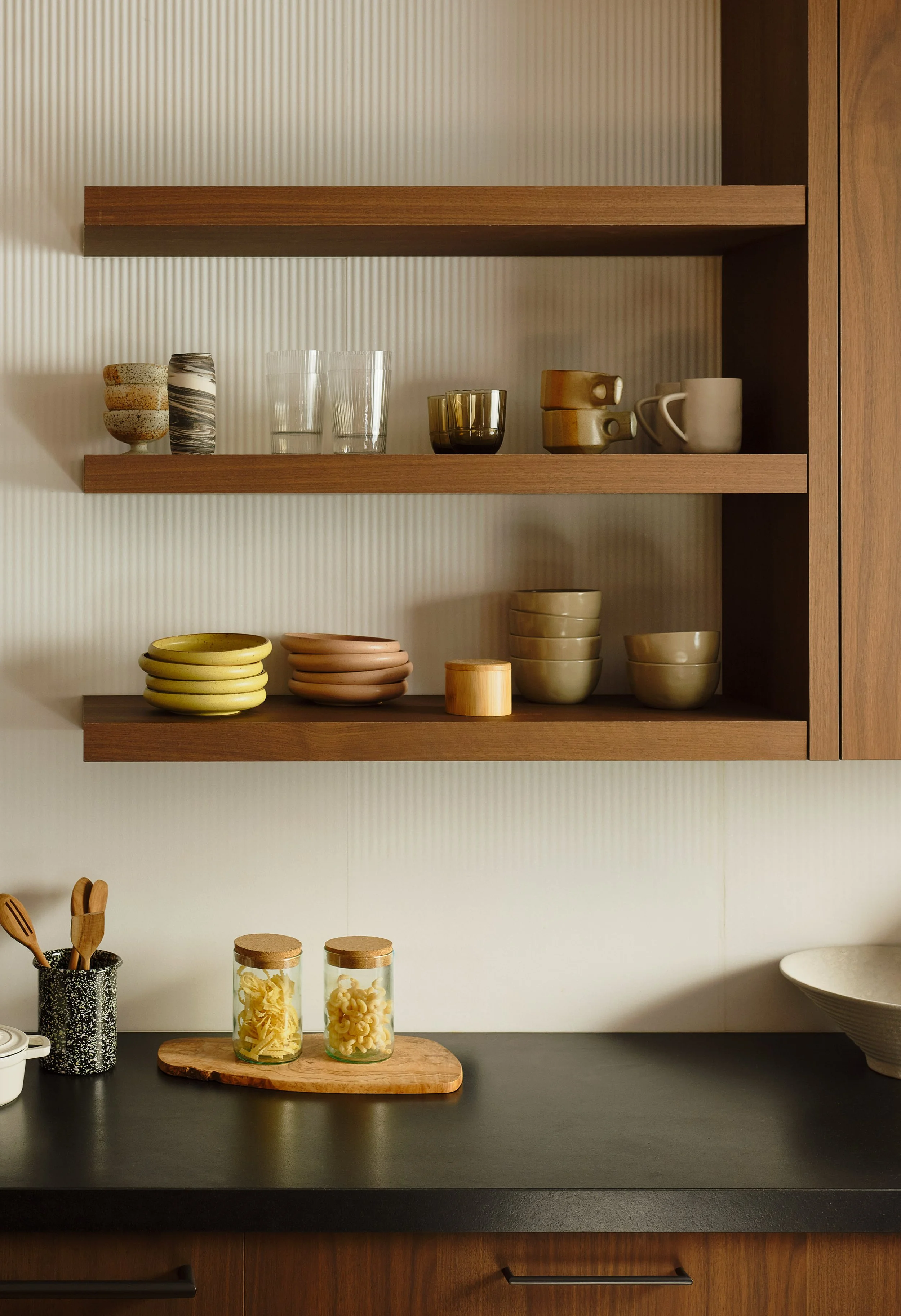 Custom wood shelving and cabinetry at Lakeshore Residence