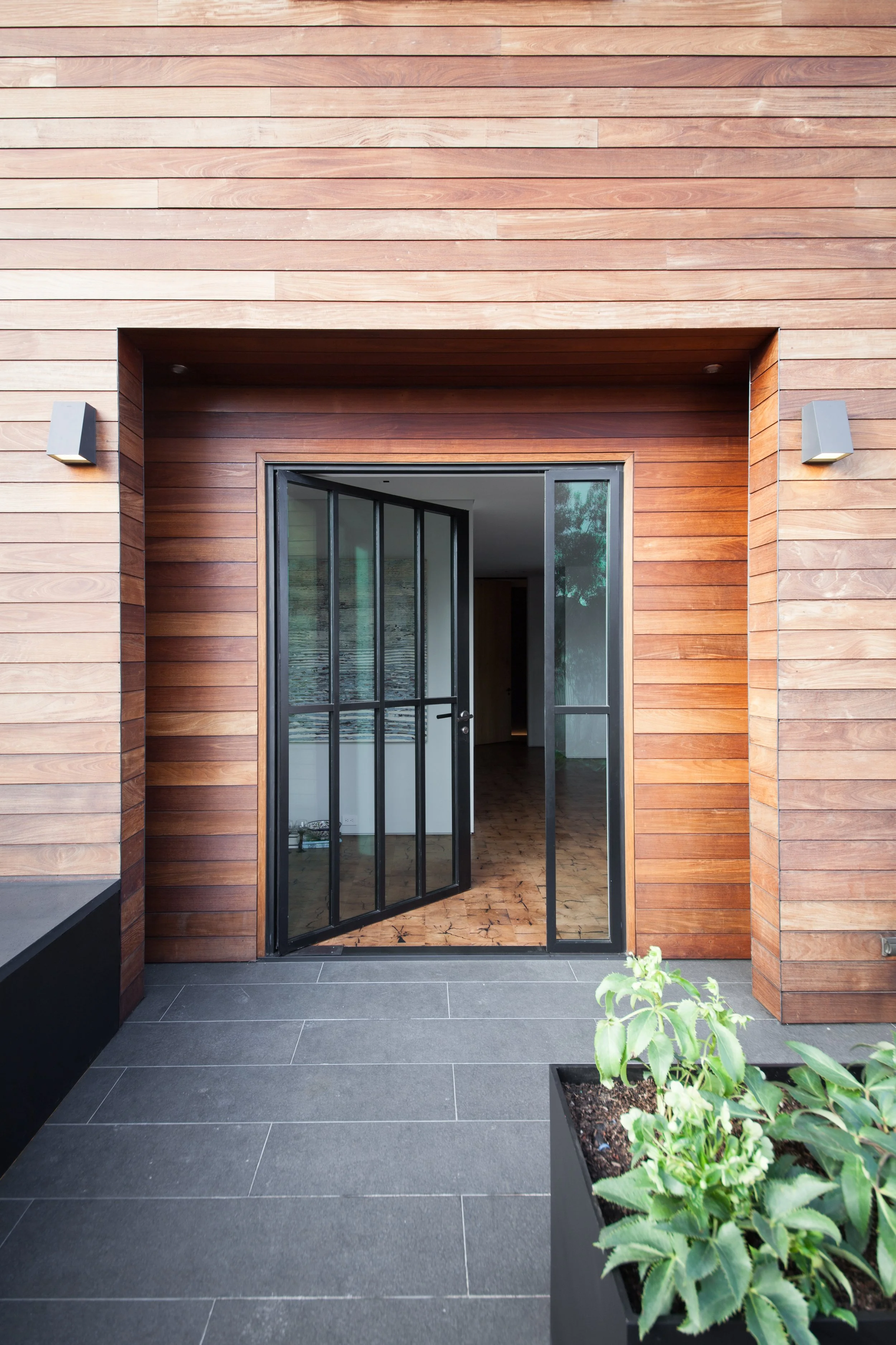 Contemporary wood facade and glass entry of a Telegraph Hill home