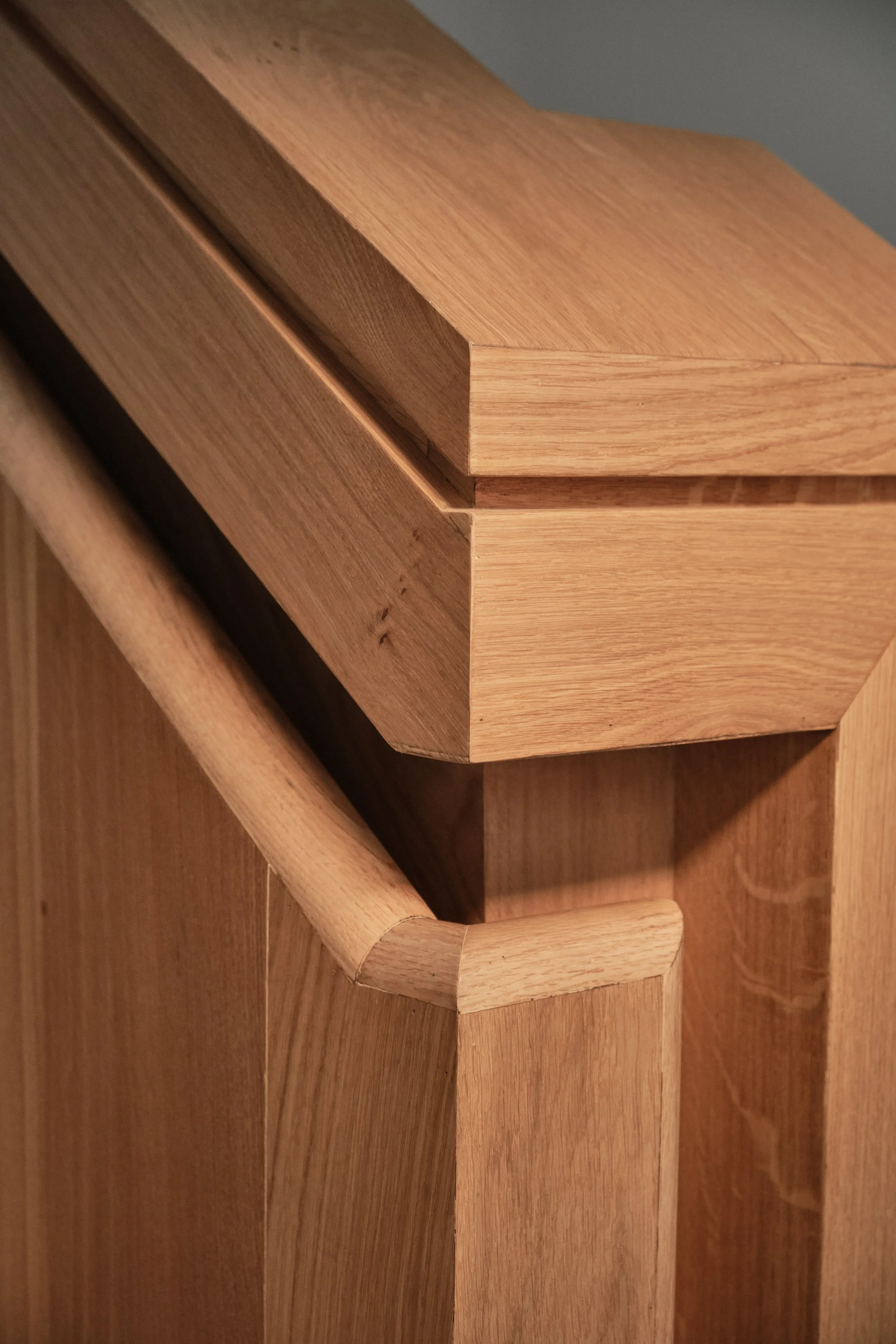 Custom wood staircase with recessed handrail