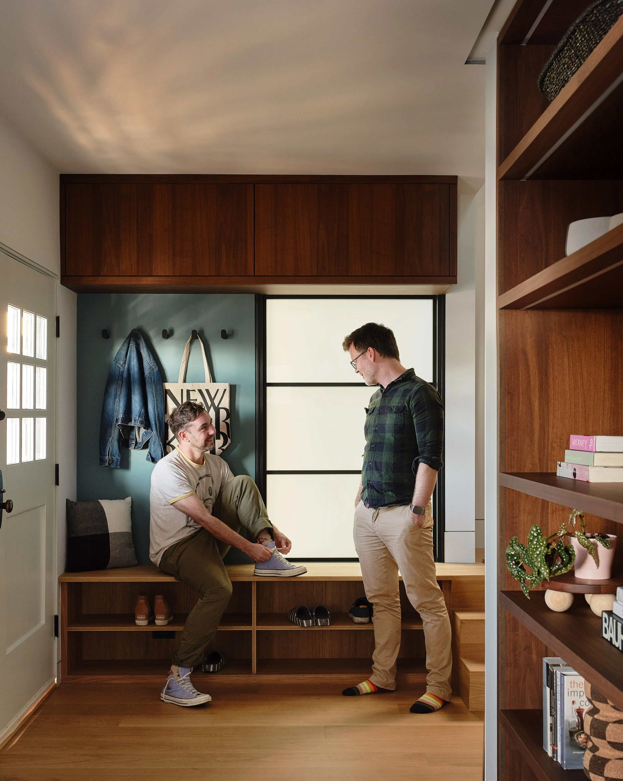 Renovated 1921 Craftsman home in Oakland with a modern wood entry