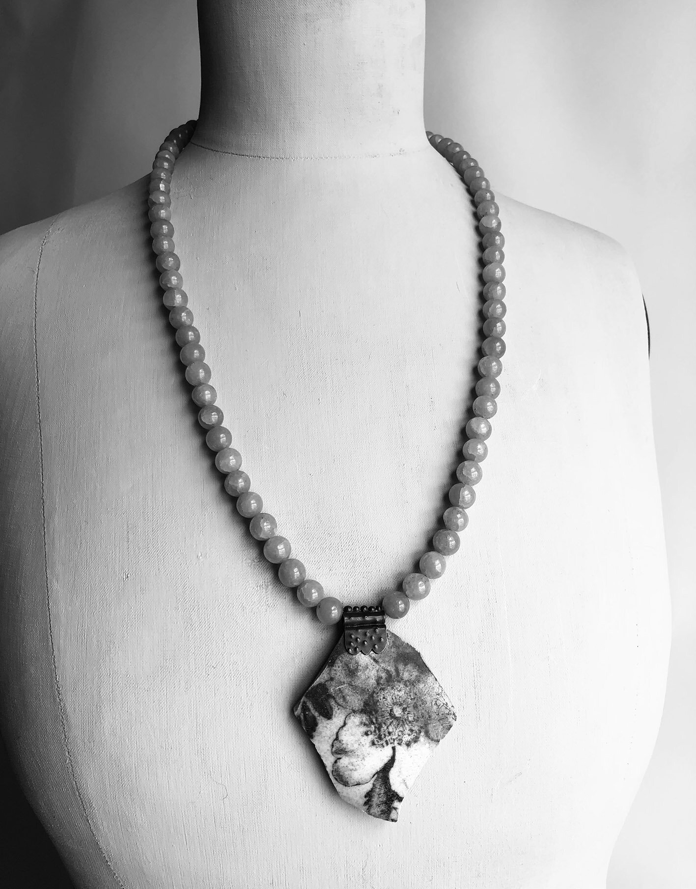 Alison Boyce Ceramic Fragment Necklace displayed on Antique Dressmakers Mannequin