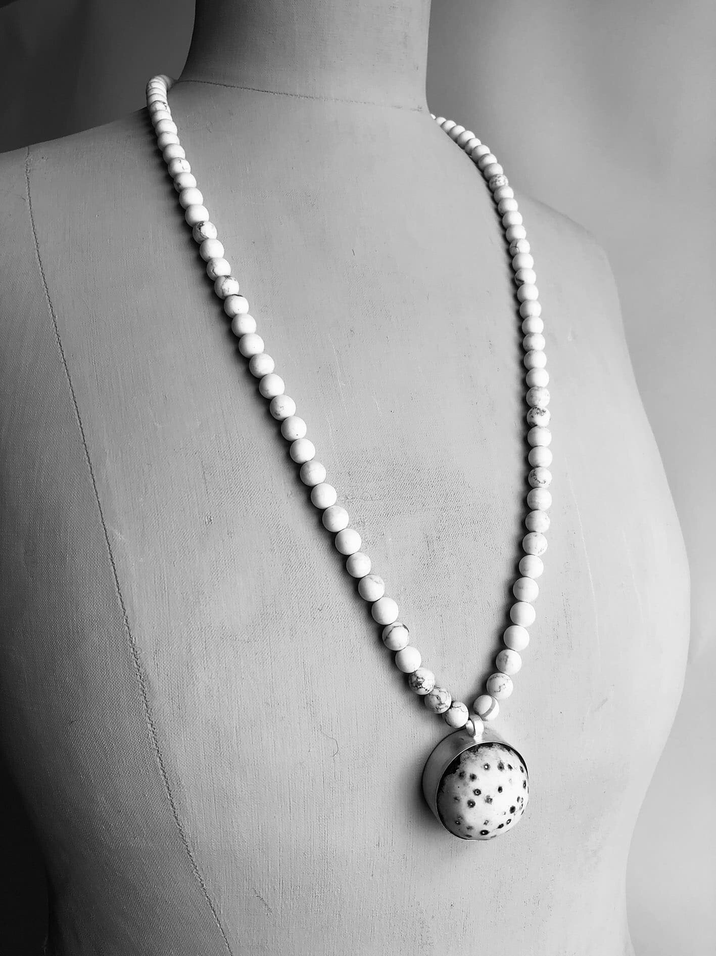 Alison Boyce Domed Enamel Necklace displayed on vintage tailors dummy