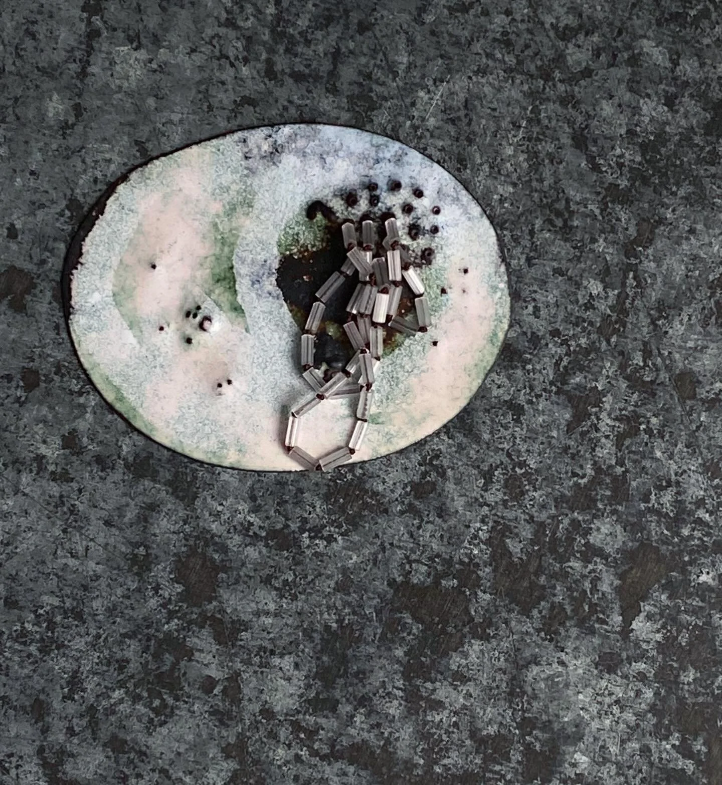 New piece. I like to see the contrasts,  dark  grays and brighter lighter tones. Wet beach pebbles and shadows. Approaching winter. Misty mornings.  #alisonboycejewellery #enamel #timeworn #weathered #precious #found