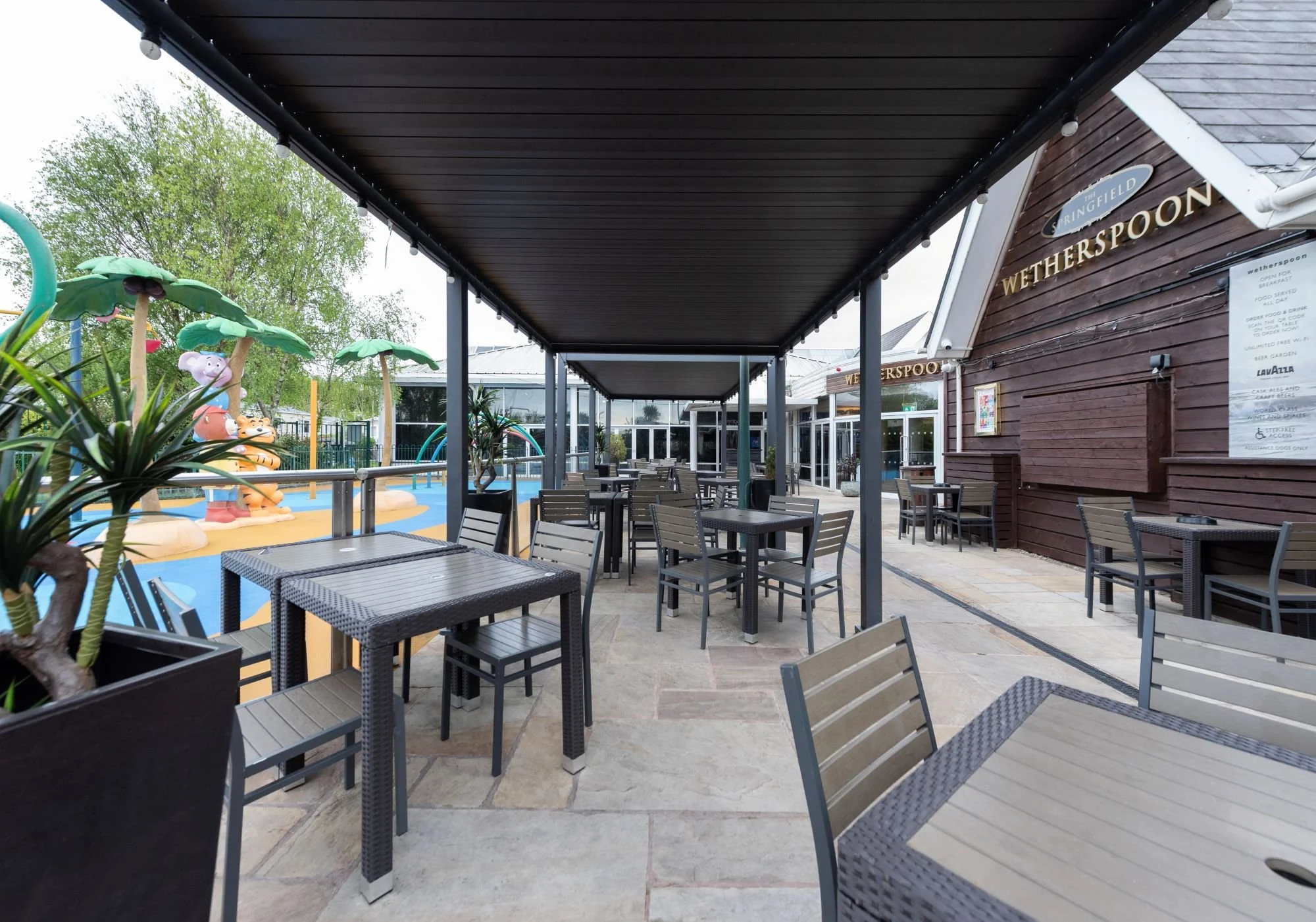 Haven Cala Gran Wetherspoons refurb Medlock frb outdoor covered seating area and springfield pub sign