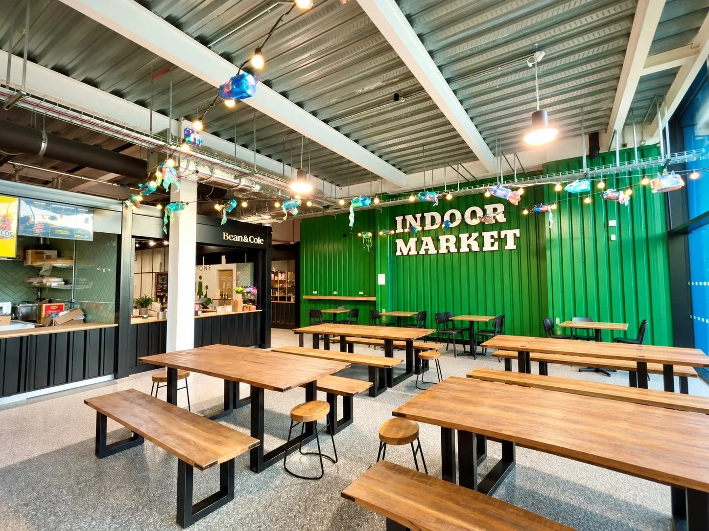 refurbished indoor market sign and benches at northwich market at barons quay fitted out by medlock frb