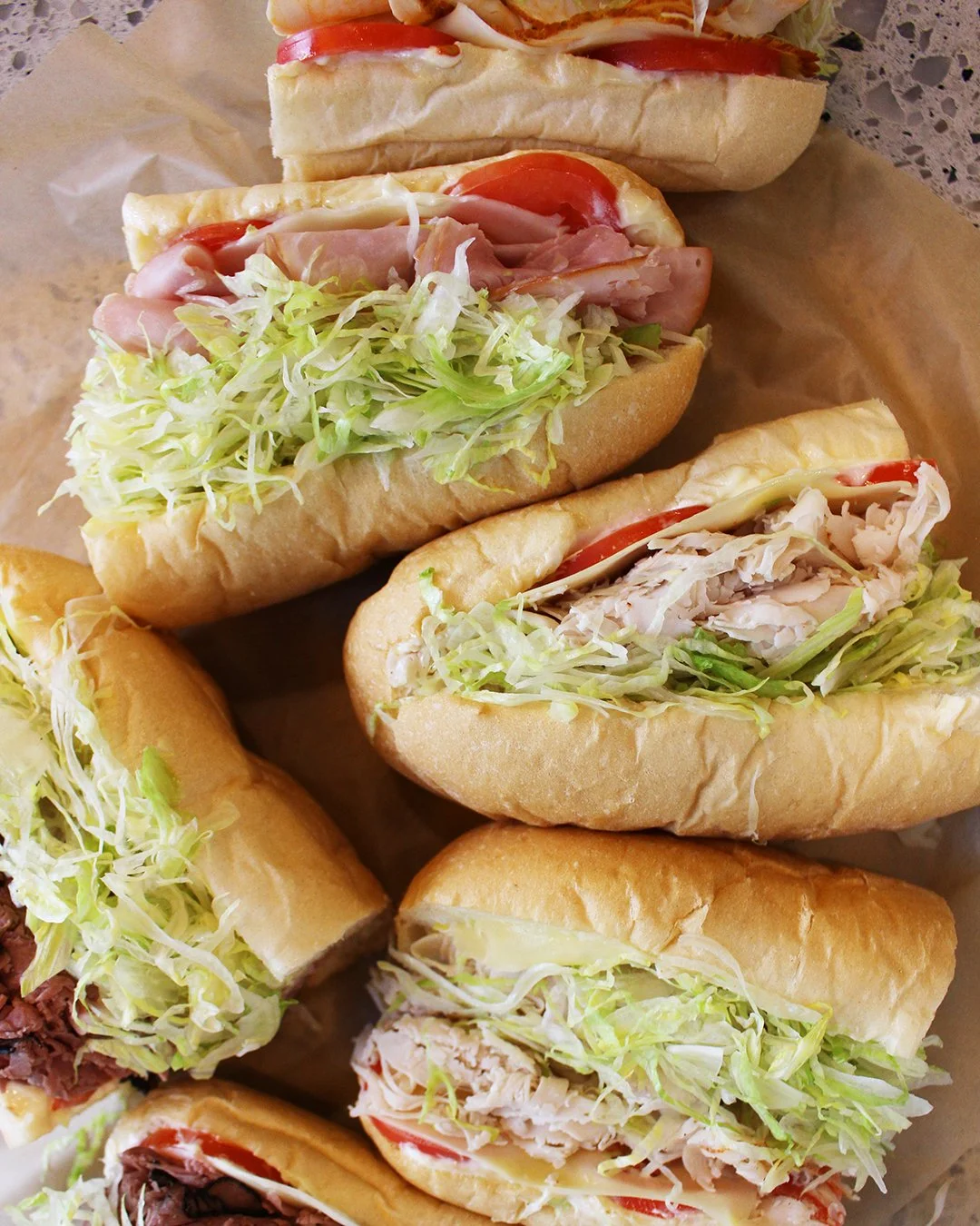 @knuckies Hoagies is BIG on BREAD! Whatever sandwich you order, know it's served in their delicious, one of a kind roll! Eat on their patio, or take out for a tasty meal. 

#sandwiches #hoagies #bread  #crabapplemarketga #crabapple #crabapplemarket #