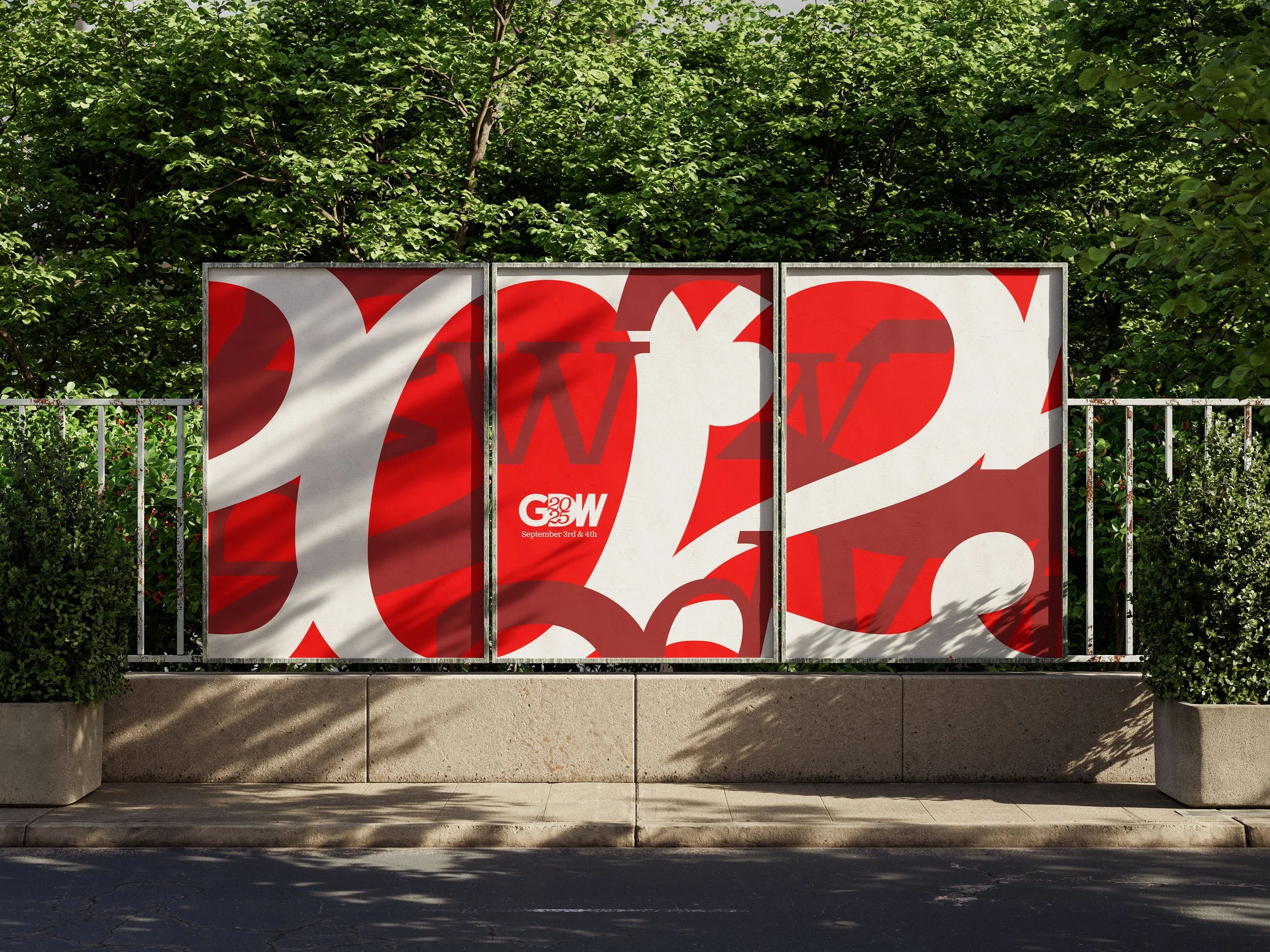 An abstract typographic layered image in the background with the abbreviated wordmark "GDW" (with 2025 in the negative form of the D) on top.