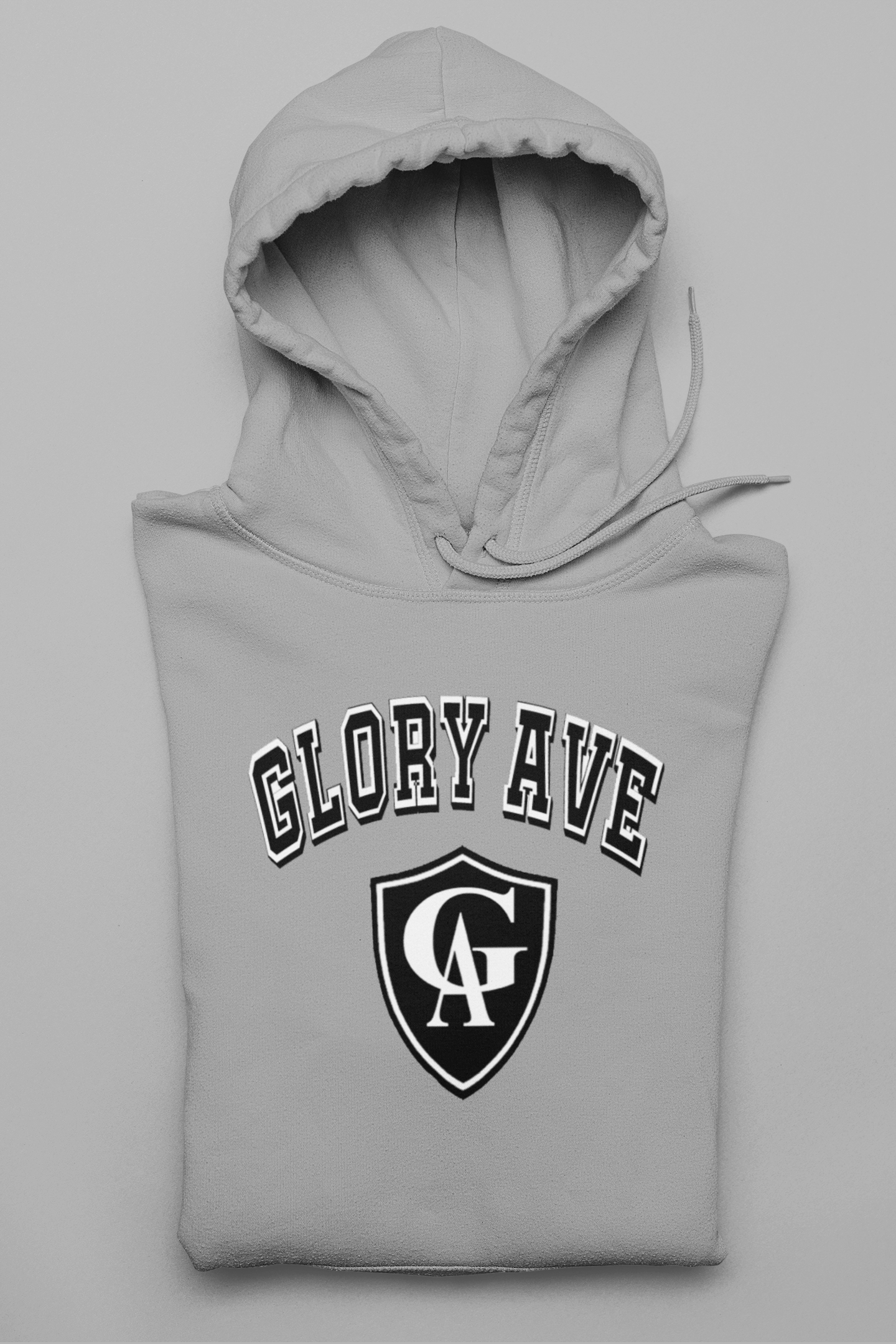 mockup-of-a-folded-pullover-hoodie-against-a-solid-surface-33898 (4).png