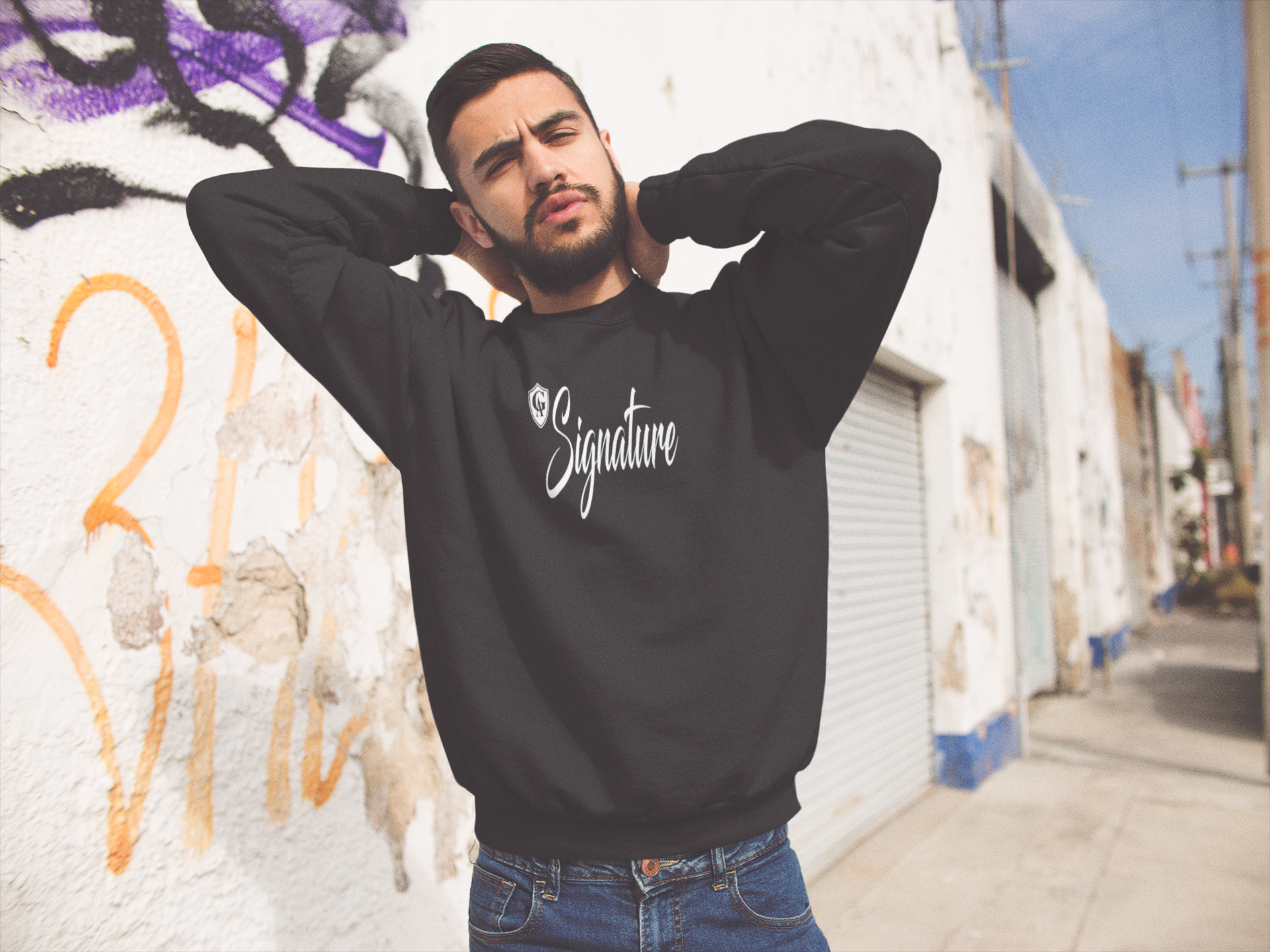 mockup-of-an-hispanic-man-wearing-a-crewneck-sweatshirt-while-doing-faces-in-the-street-a13423 (1).png