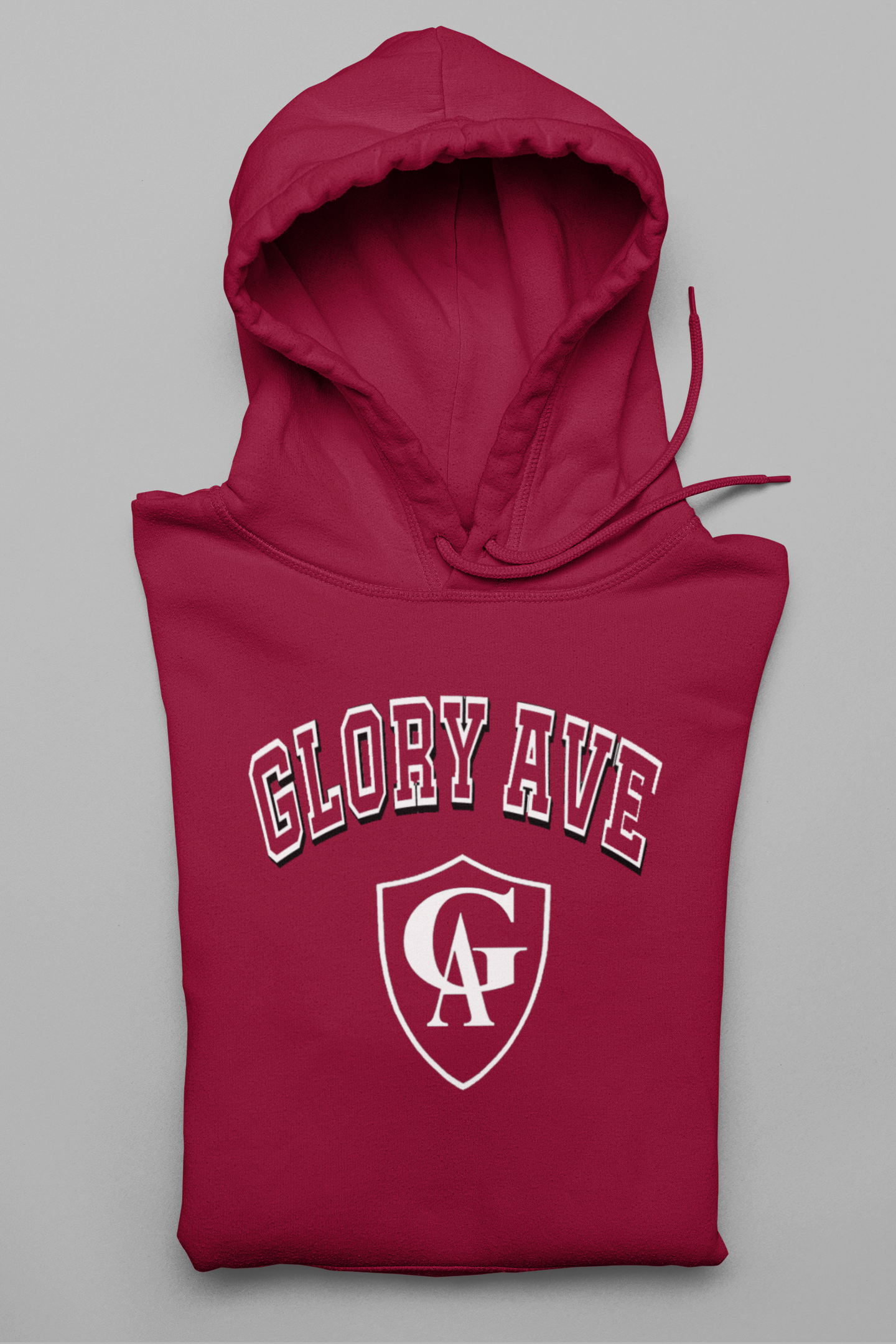 mockup-of-a-folded-pullover-hoodie-against-a-solid-surface-33898 (2).png