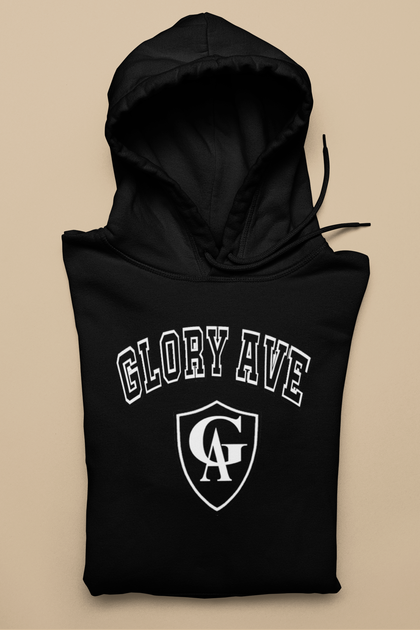 mockup-of-a-folded-pullover-hoodie-against-a-solid-surface-33898 (1).png