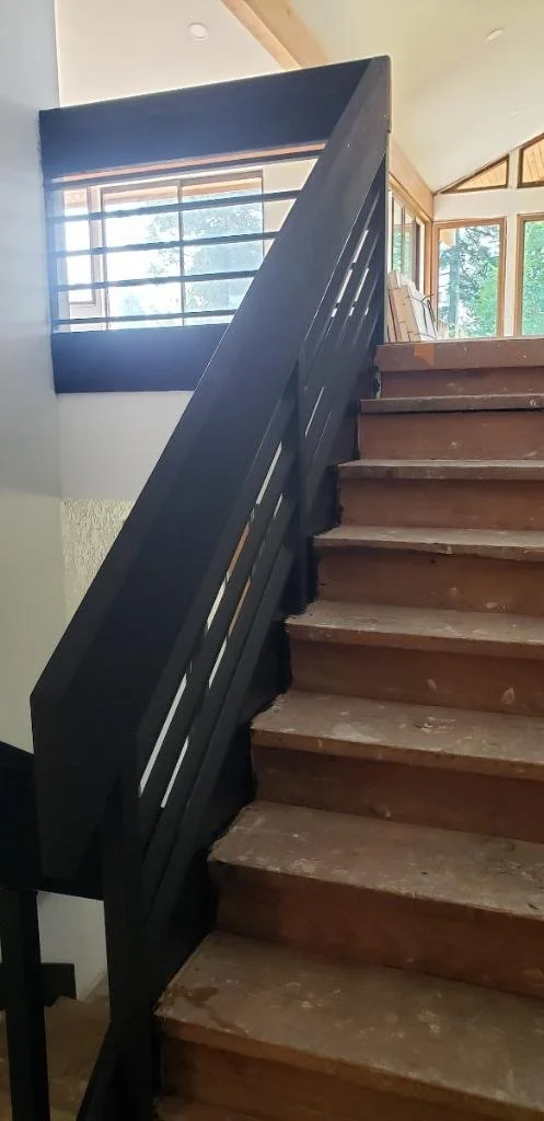 Indoor ebonite wood and black steel handrail