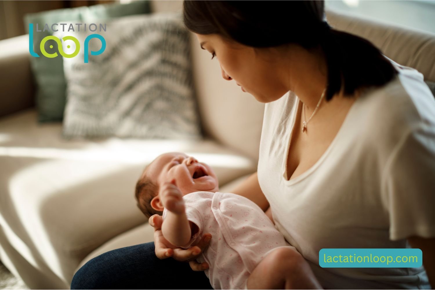 fussy baby being attended to by mom