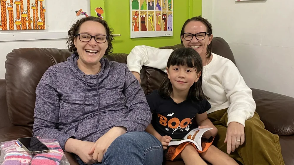 LGBT+ parents at a community event