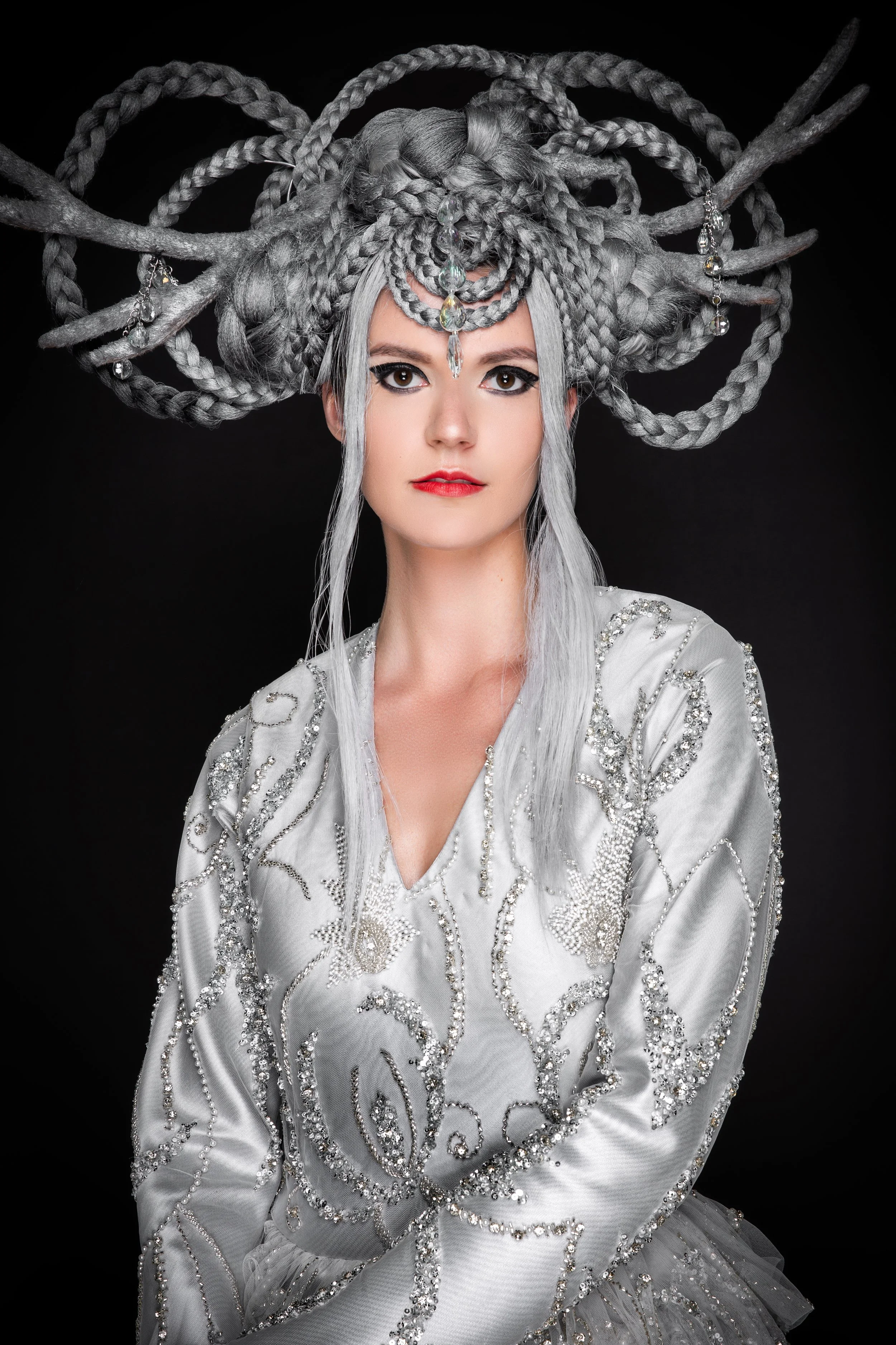 Woman in fantasy costume with elaborate braided hair