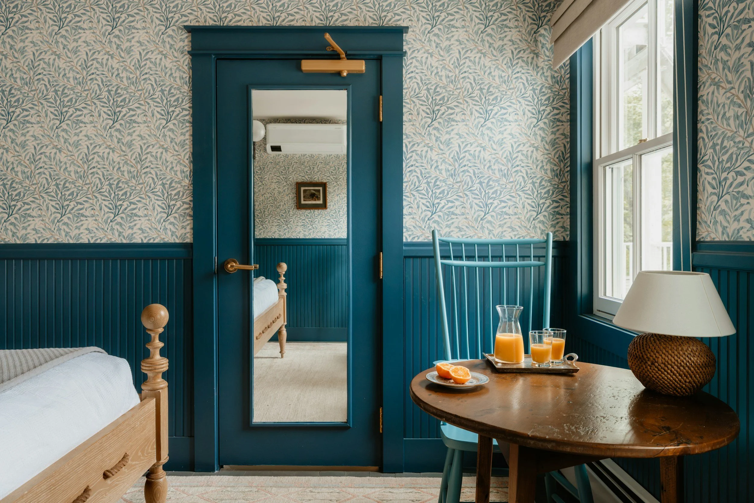 Teal room in a boutique hotel | Studio MADM Co