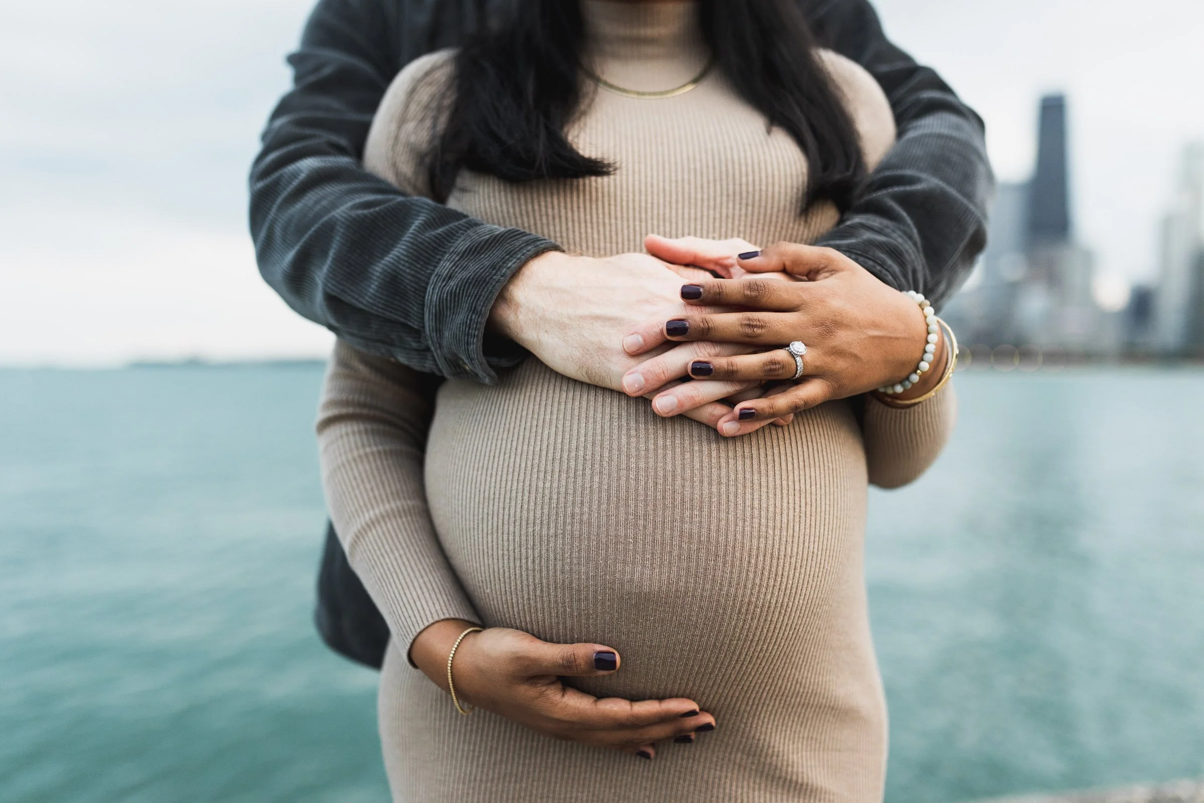 baby-bump-mom-dad-hands.jpg