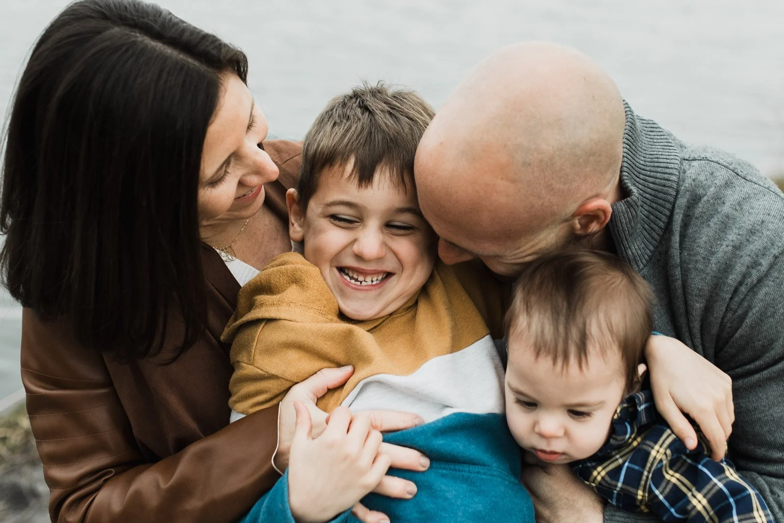 family-of-four-laughing.jpg