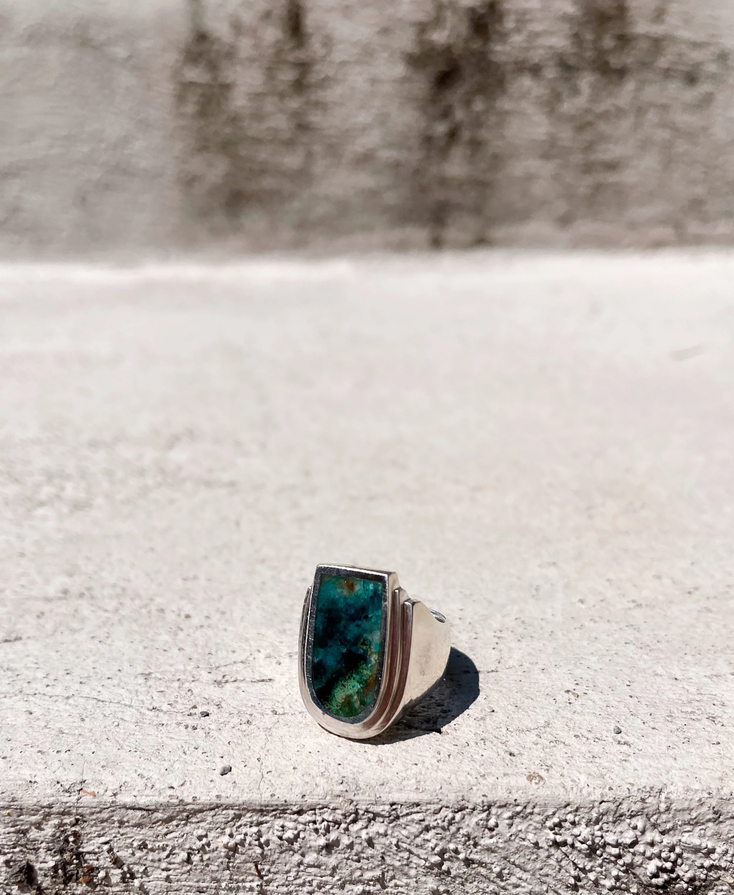 The Flat Top ring with chrysoprase gemstone inlay. Sculptural. Substantial. A whole lotta ring with a gorgeous ocean of a stone as the focal point. 

Size 7.25 - 7.5
On sale for $460+hst

Another member of the One&amp;Only collection - one of a kind(