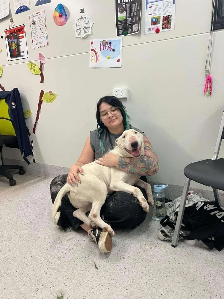 Gabby giving Loki cuddles.jpg